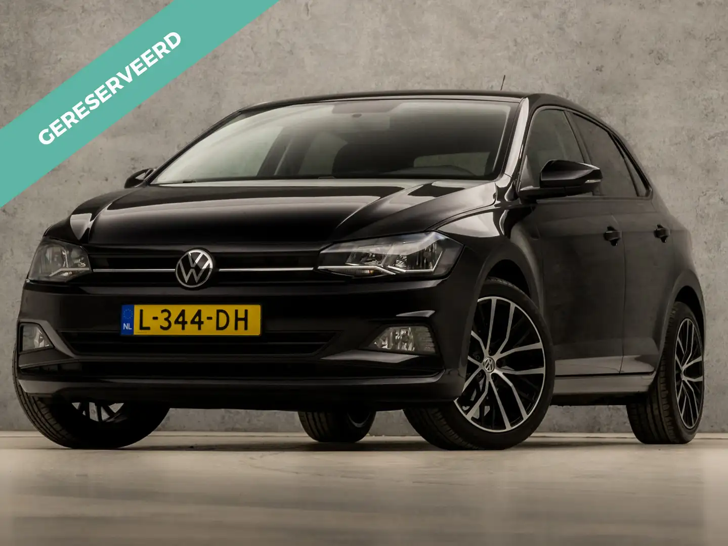 Volkswagen Polo 1.0 TSI Sportline Automaat (APPLE CARPLAY, PARKEER Zwart - 1