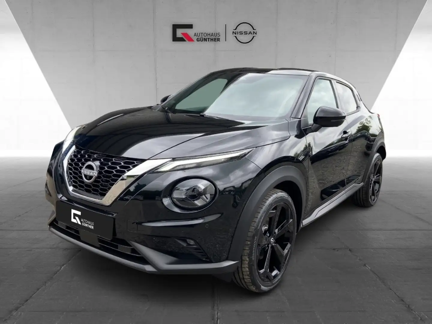 Nissan Juke TEKNA 114PS-6MT Winter/Bose/360°/Carplay Zwart - 1