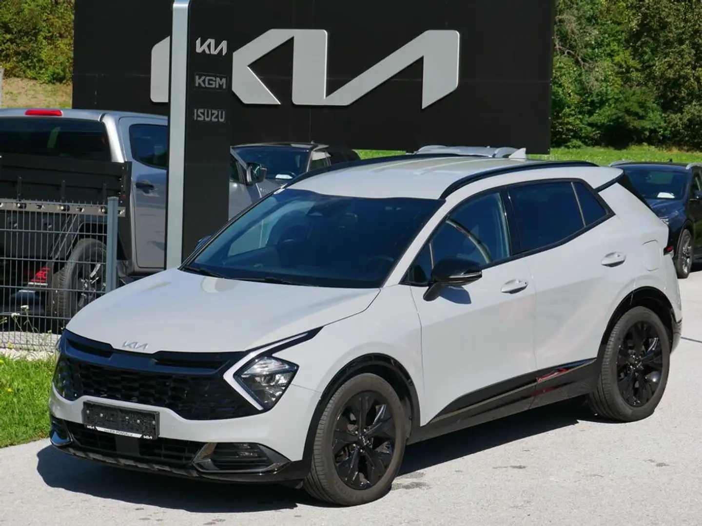 Kia Sportage 1,6 TGDI 48V Anniversary AWD DCT Grau - 1