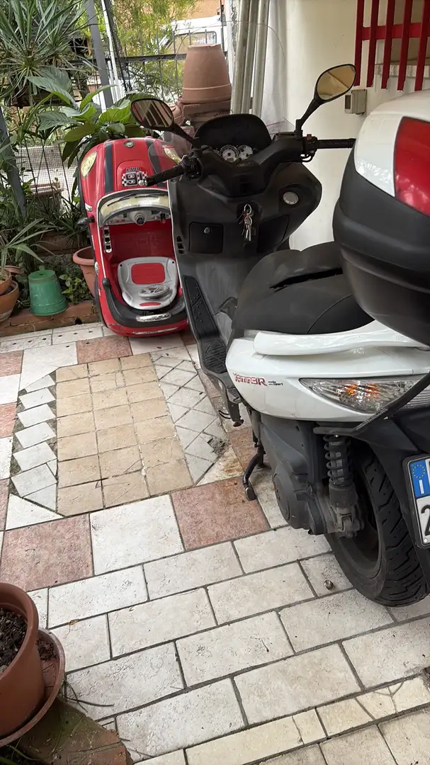 Kymco Xciting 300i 300 r - 1