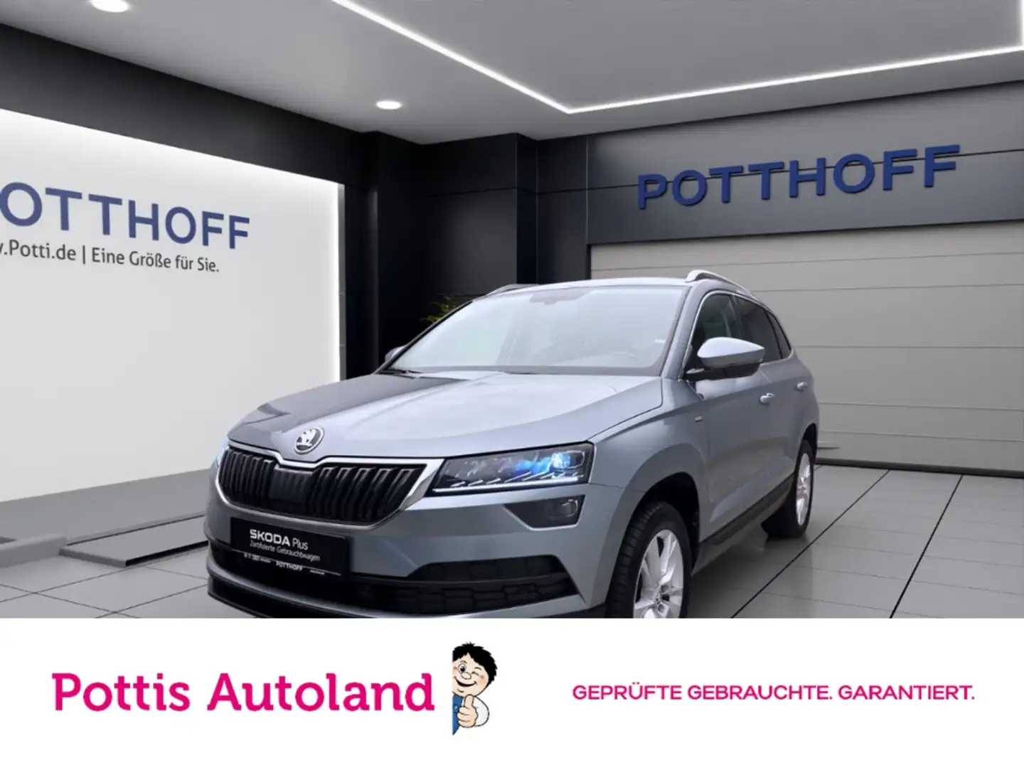 Skoda Karoq 1.0 TSI CLEVER KAMERA PDC SITZHZG KLIMA Grau - 1