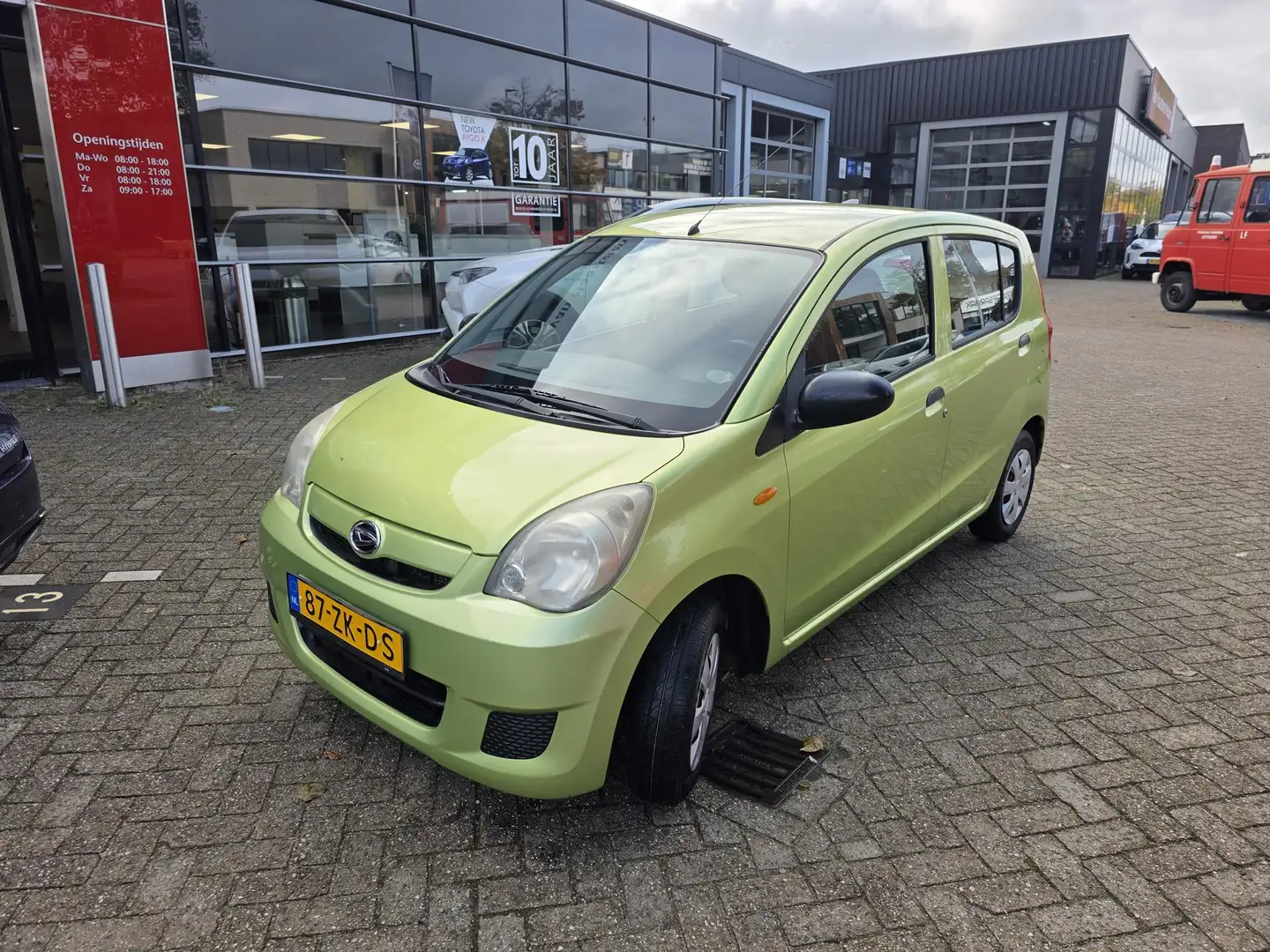 Daihatsu Cuore 1.0 51KW 5D Trend Vert - 1
