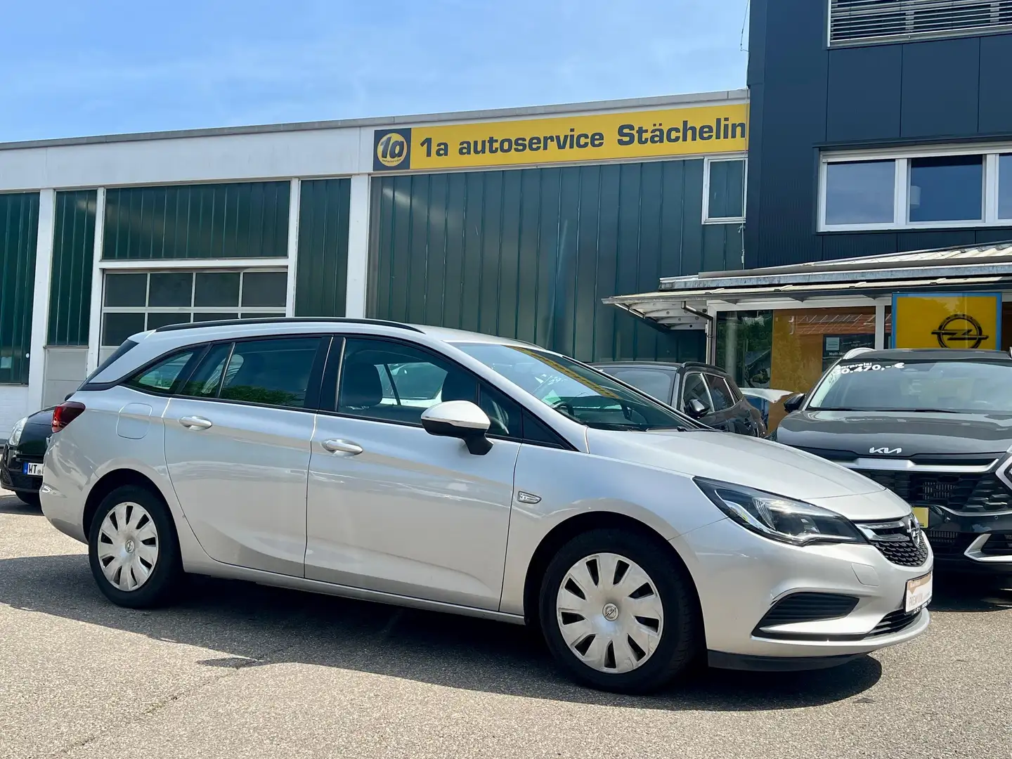 Opel Astra K ST 1.6 CDTI,S&LHZ,PDC,KLIMA,NAVI,AHK Silber - 1