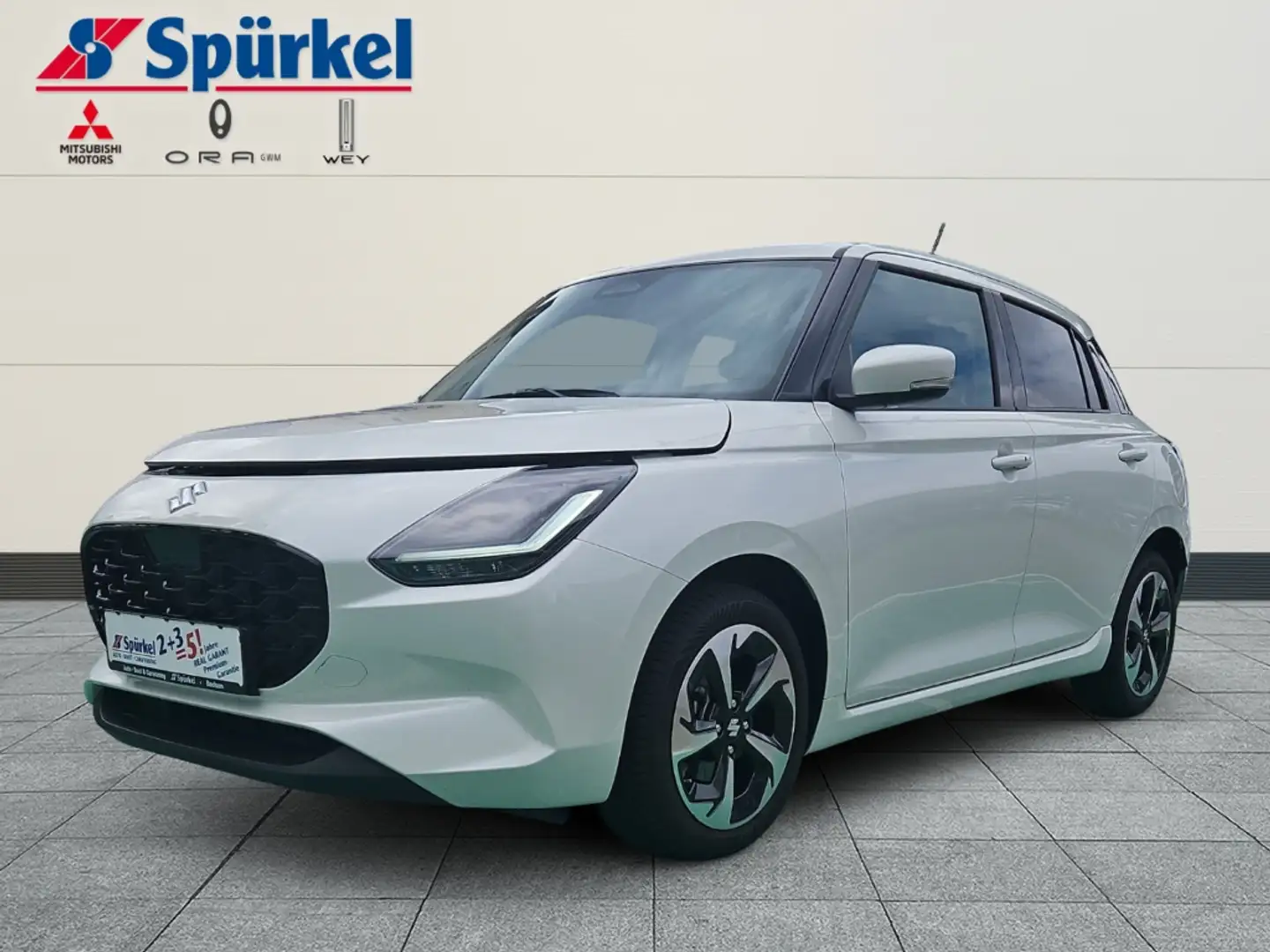 Suzuki Swift 1.2 Dualjet Hybrid 61 kW Comfort+, Allwetter Weiß - 1