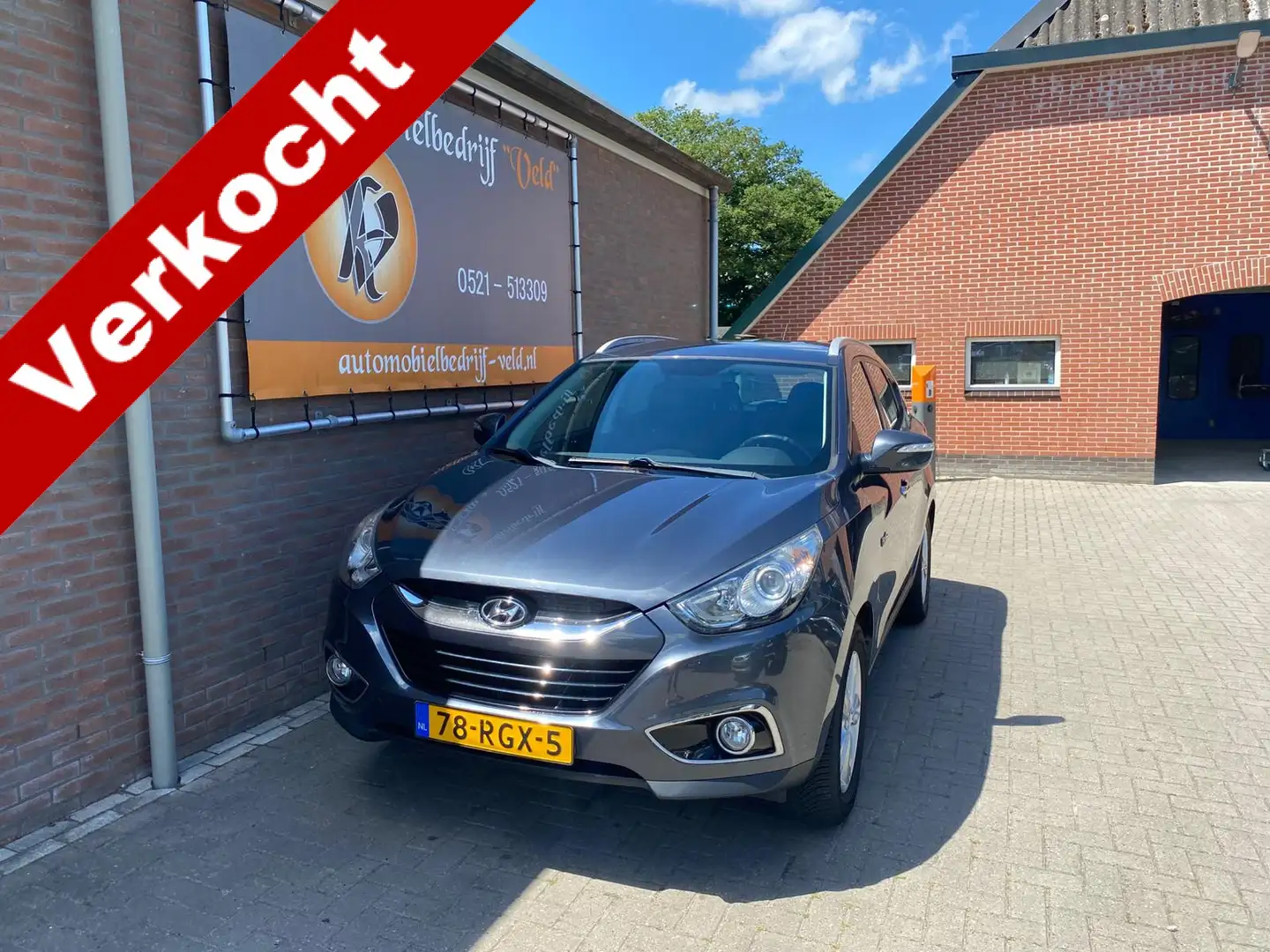 Hyundai iX35 1.6i GDI Style (TIK IN DE MOTOR) Grijs - 1