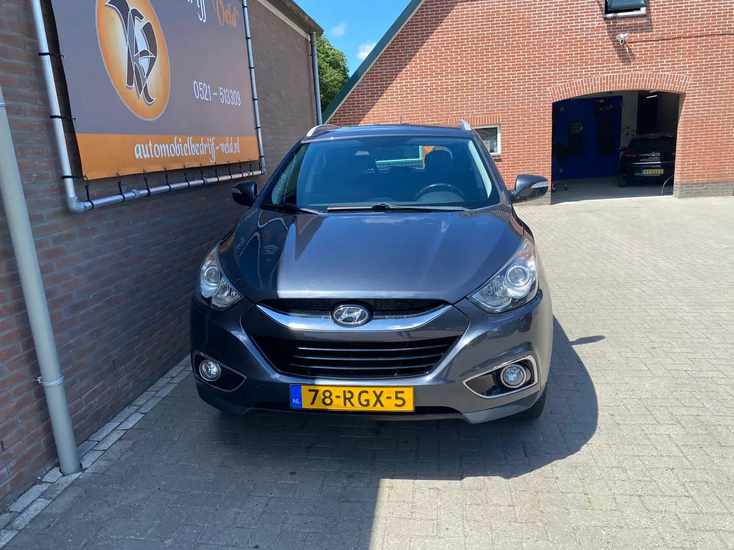 Hyundai iX35 1.6i GDI Style (TIK IN DE MOTOR) Grijs - 2