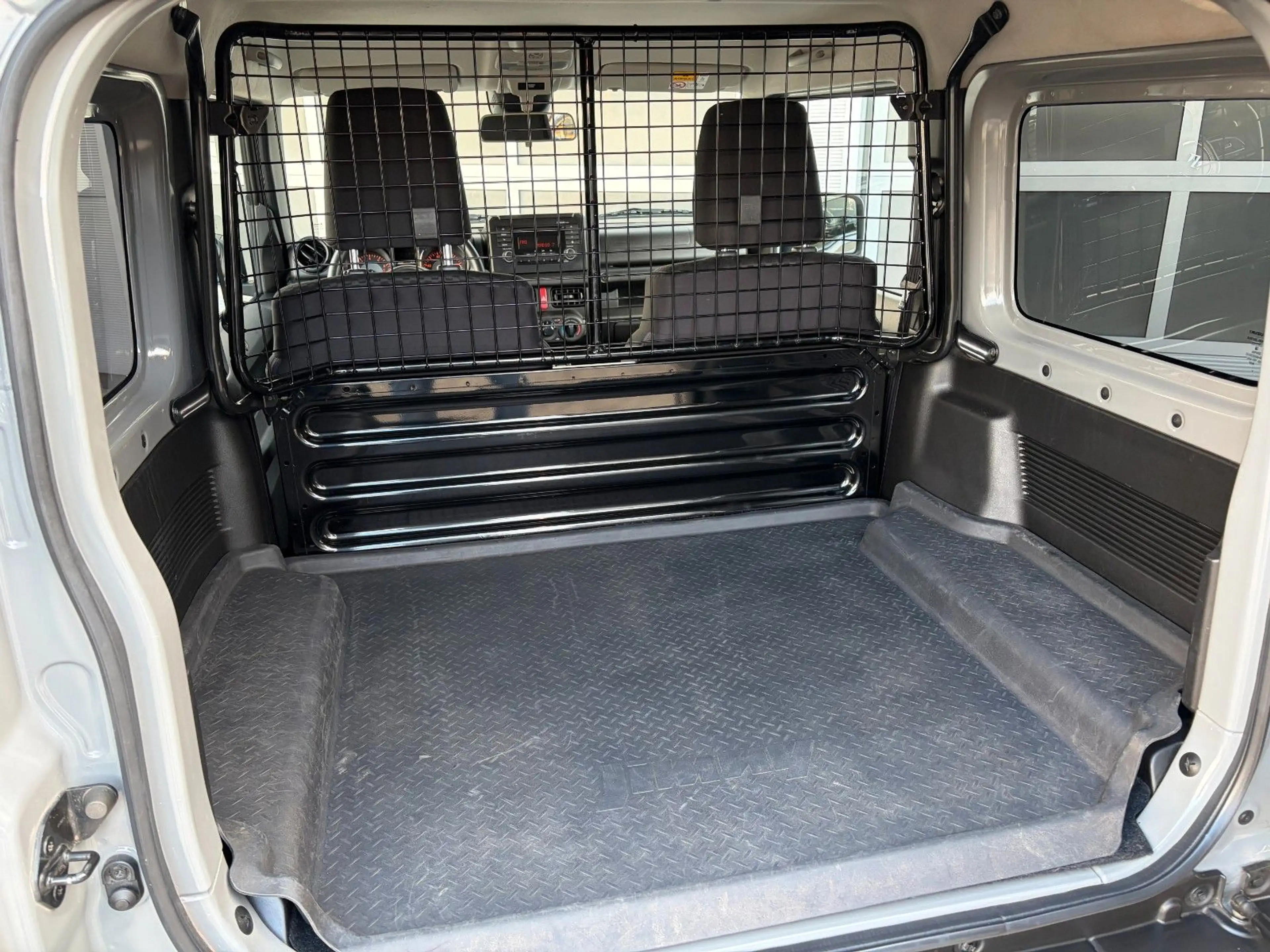 Suzuki Jimny STANDHZG SUZUKI-SCHECKH DACHTRÄGER+LEITER — photo 12