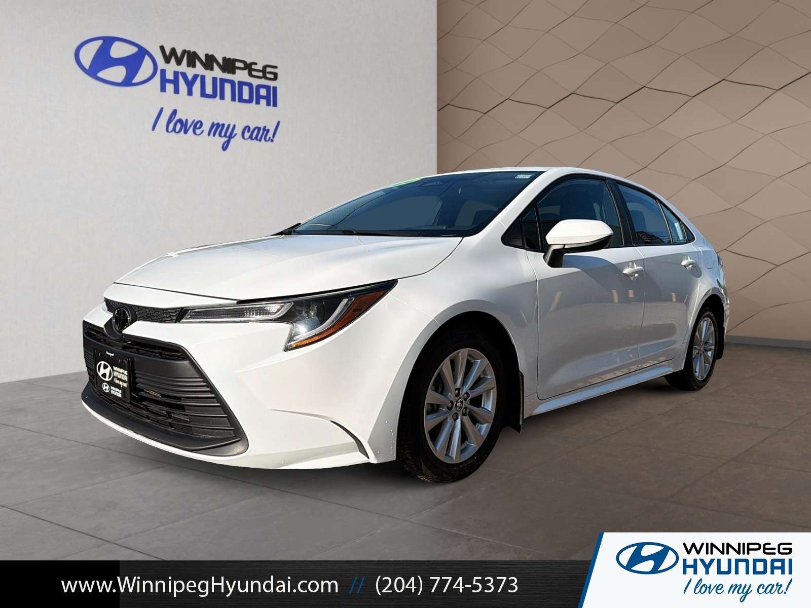 White 2024 Toyota Corolla Sedan Front-Wheel Drive Automatic