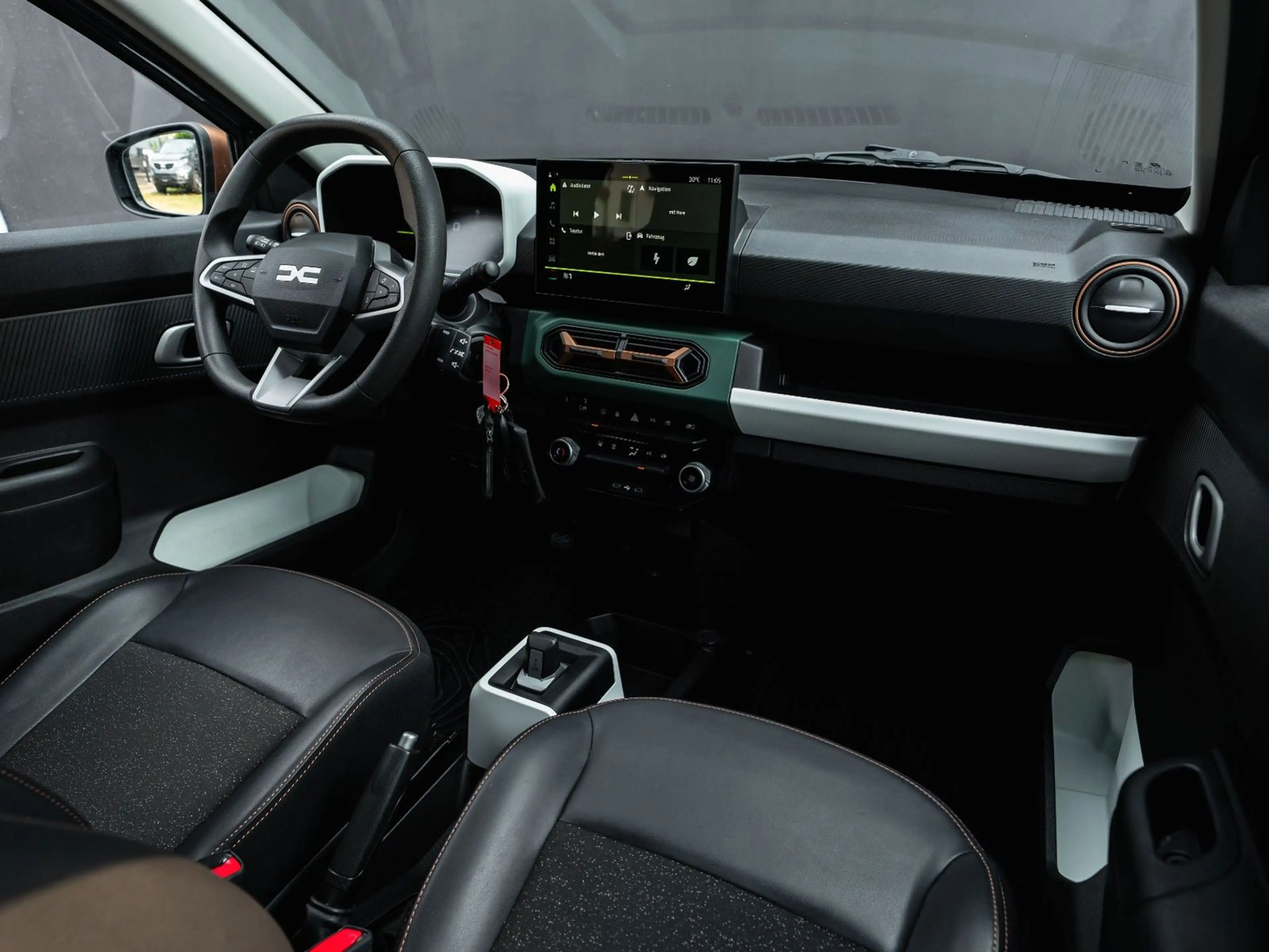 Dacia Spring Extreme 65 neues Mod Leder Navi 1Hand — photo 11