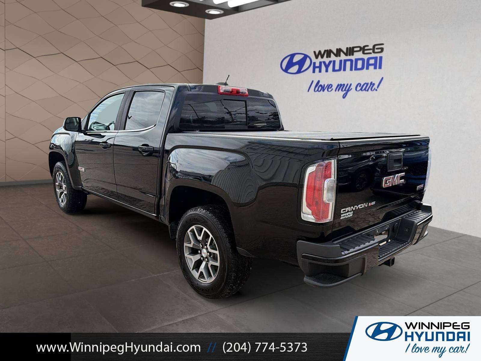 used 2020 GMC Canyon car, priced at $34,628