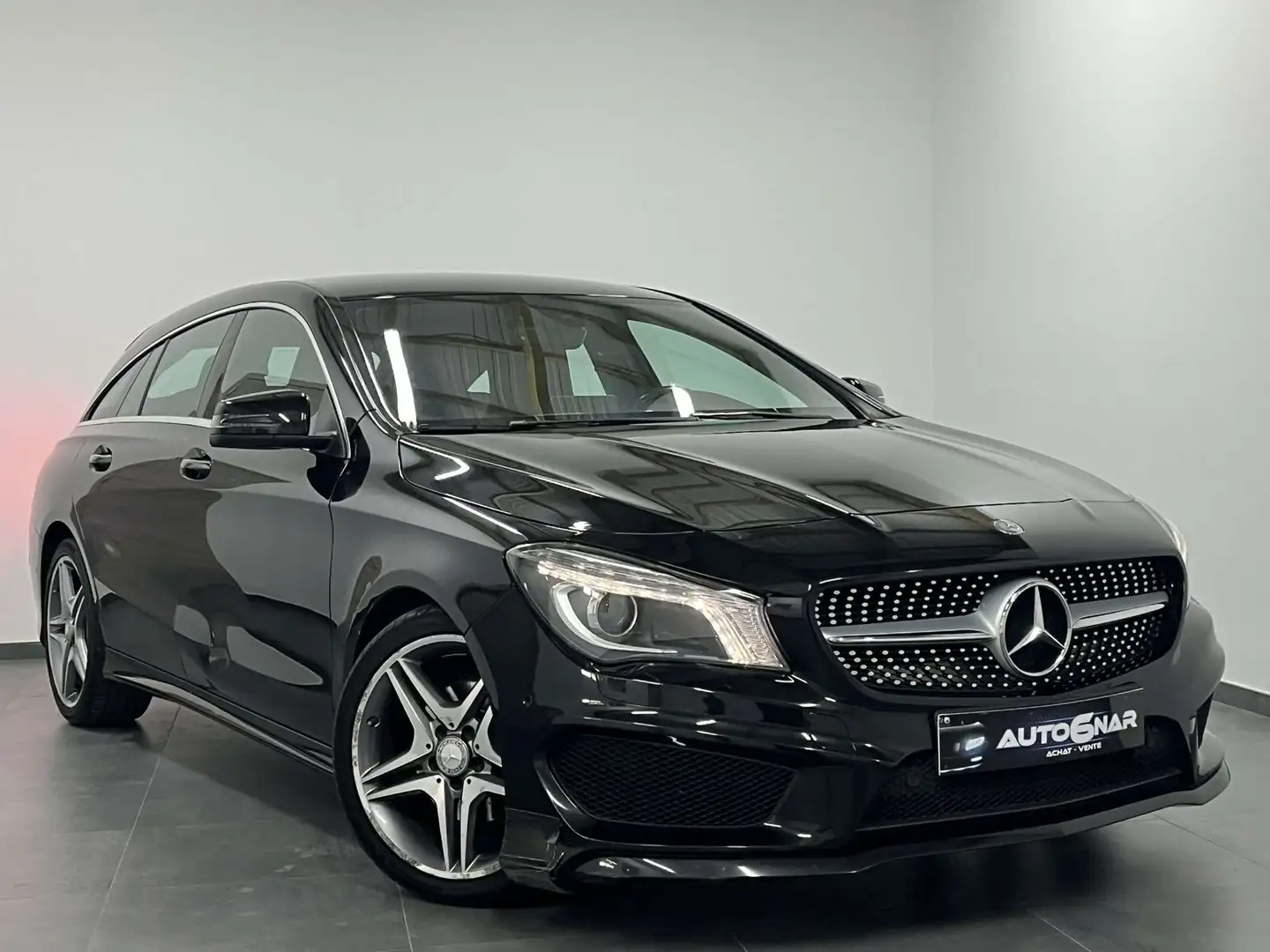 Mercedes-Benz CLA 180 Pack AMG - Boite Auto - Airco - Navi - Carnet Noir - 1