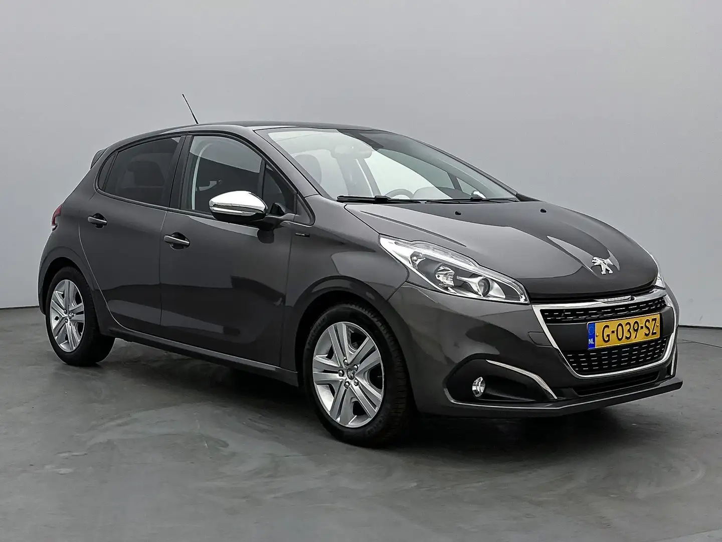Peugeot 208 Signature 82pk | Navigatie | Airco | Parkeersensor Grigio - 2