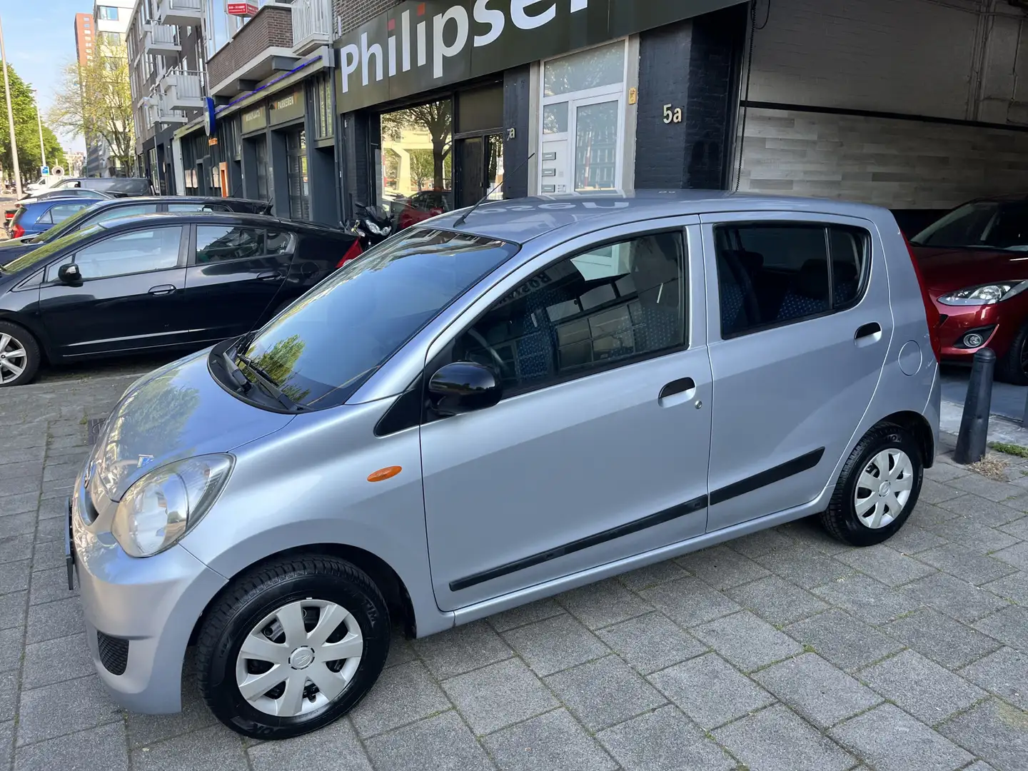 Daihatsu Cuore 1.0 Comfort Automaat .airco. Grau - 2