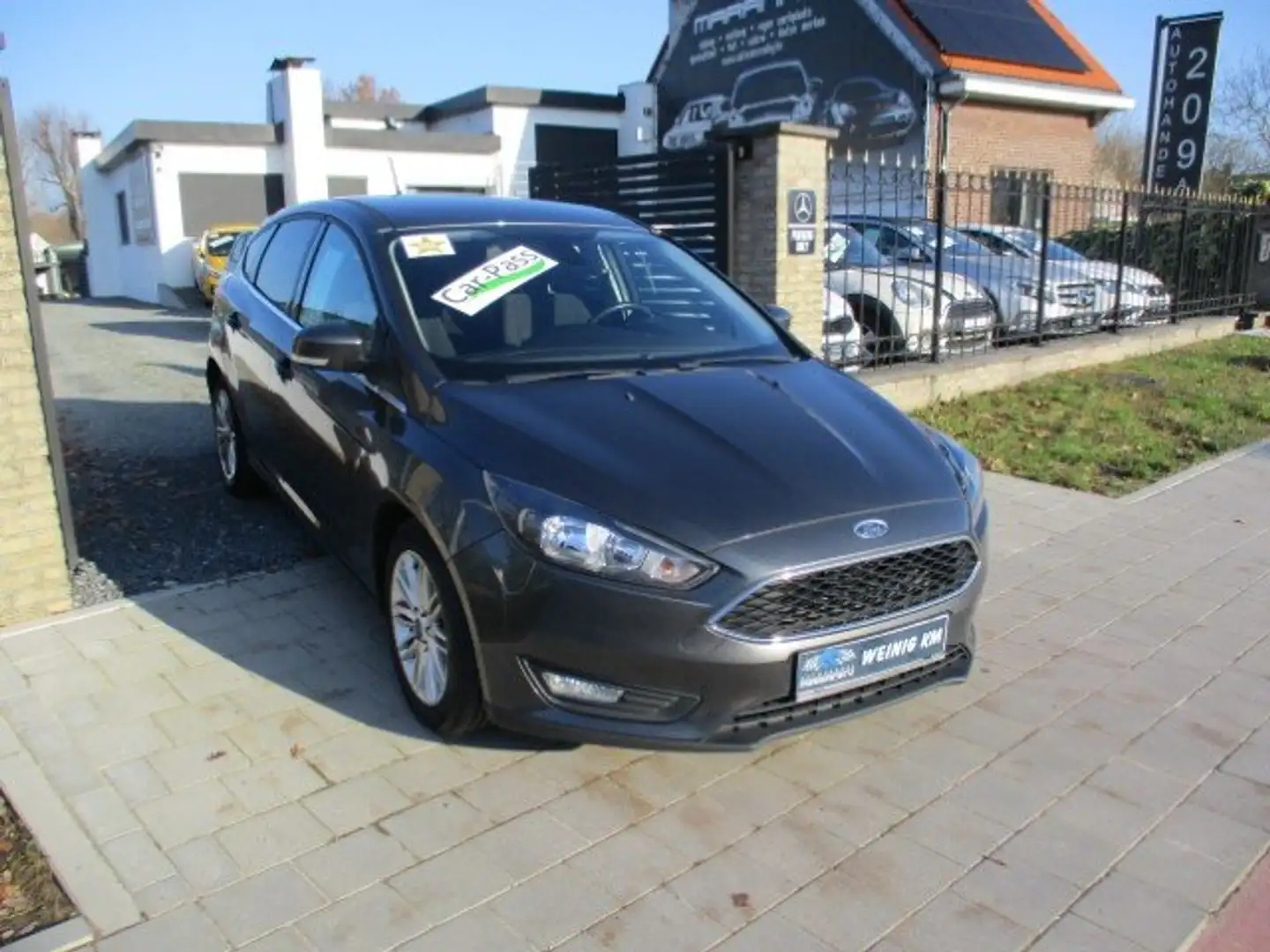 Ford Focus 1.0I EcoBoost Titainum Business AIRCO ALU NAVI PDC Gris - 1