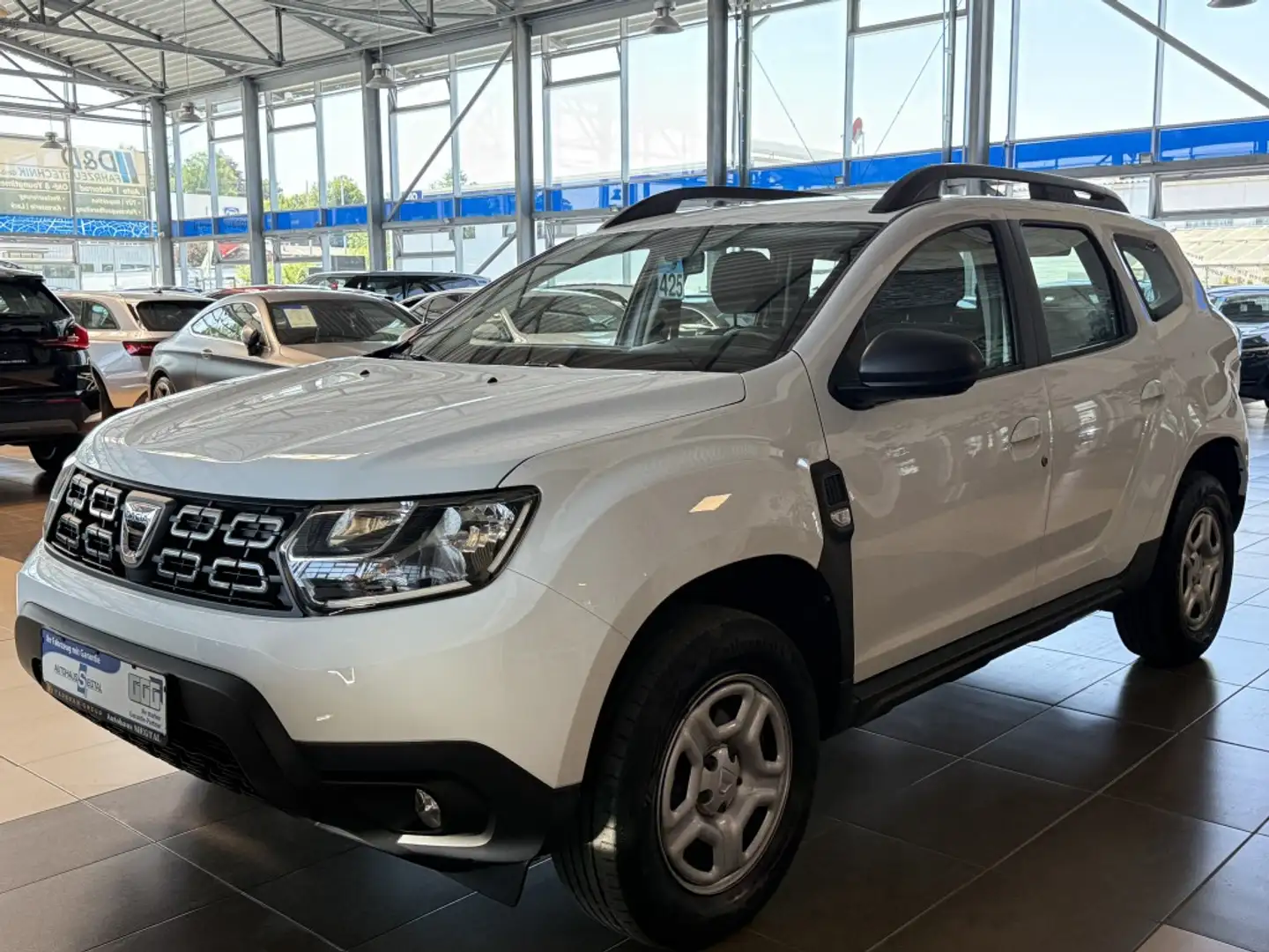 Dacia Duster Comfort*Navi*SHZ*Klima*BT-Audio*Tempomat* Weiß - 1