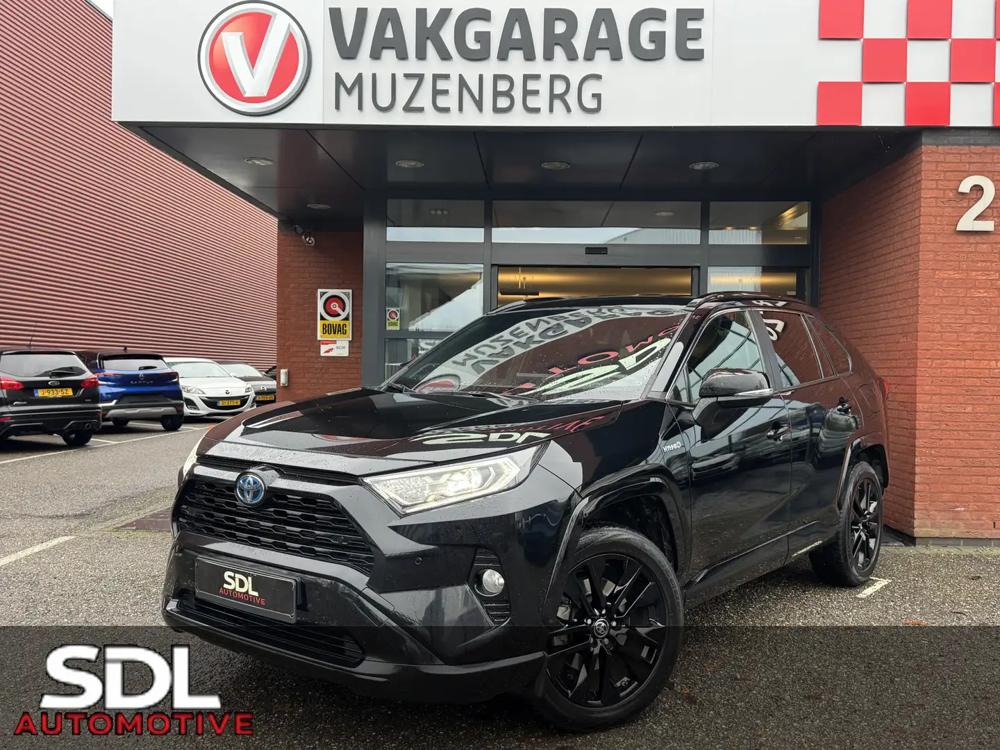 Toyota RAV 4 2.5 Hybrid Black Edition // JBL AUDIO // NAVI // A Zwart - 1