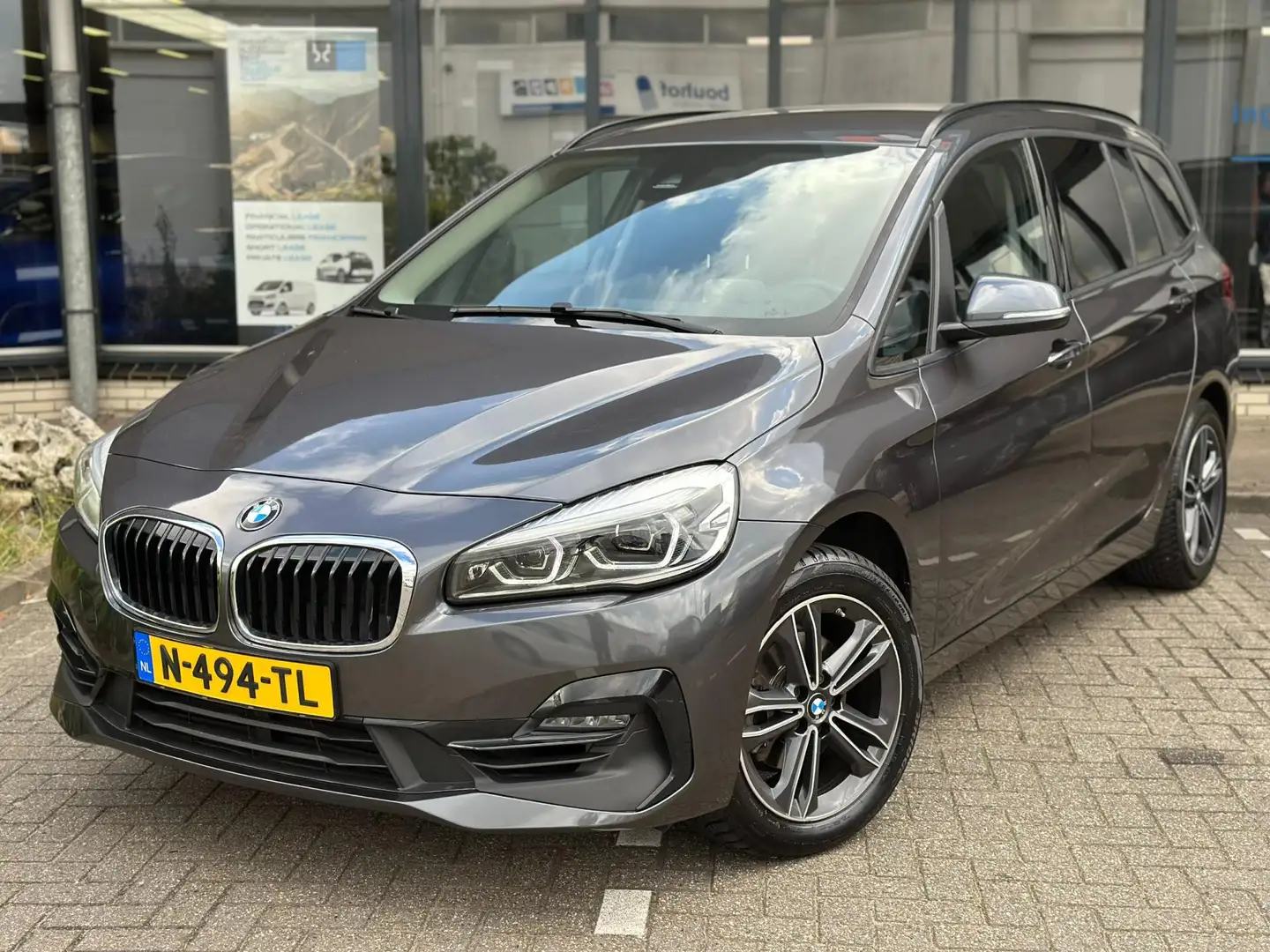 BMW 216 2-serie Gran Tourer 216i 7p. Business Edition Grijs - 1