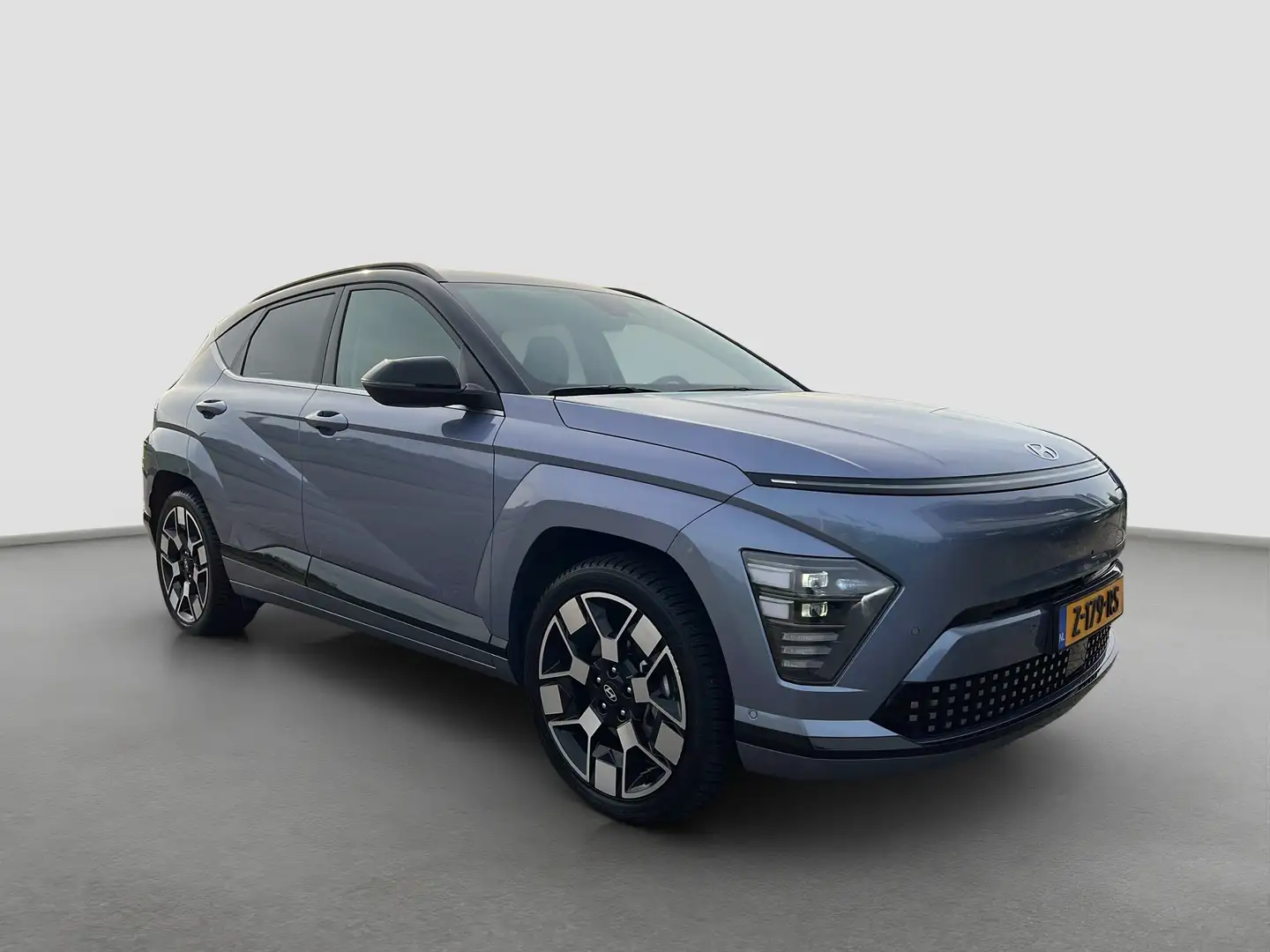 Hyundai KONA Electric Premium 65.4 kWh 217pk | Leder | Adaptive Blauw - 2