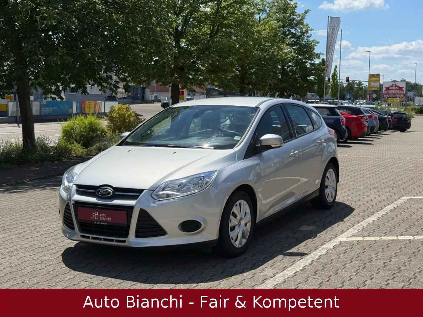 Ford Focus 1.6 Ti-VCT Lim *Autm *PDC *Navi *Bluetooth Silber - 1