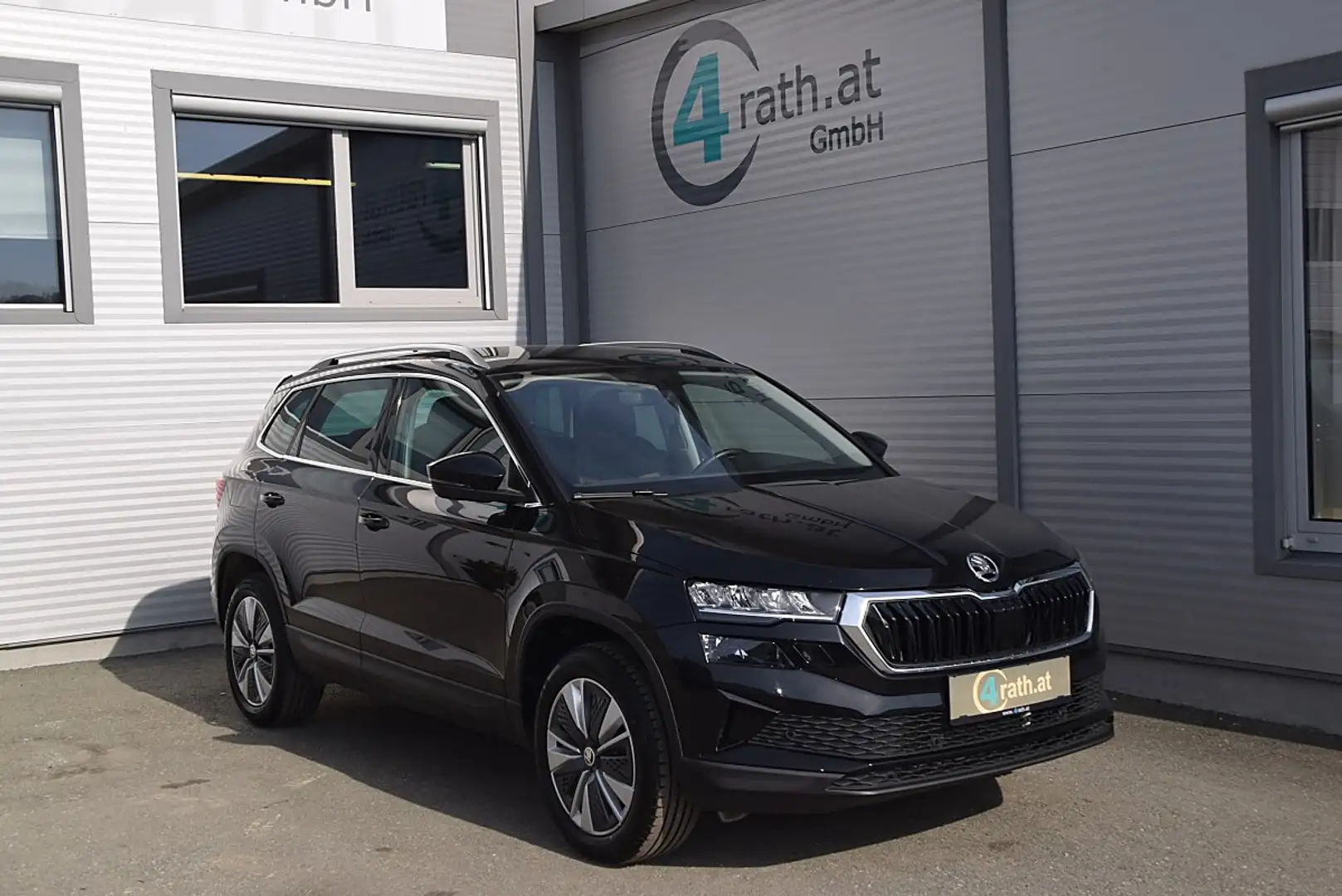 Skoda Karoq 1,5 TSI ACT DSG Style AHK/LED/ACC/NAVI/RFK Schwarz - 1