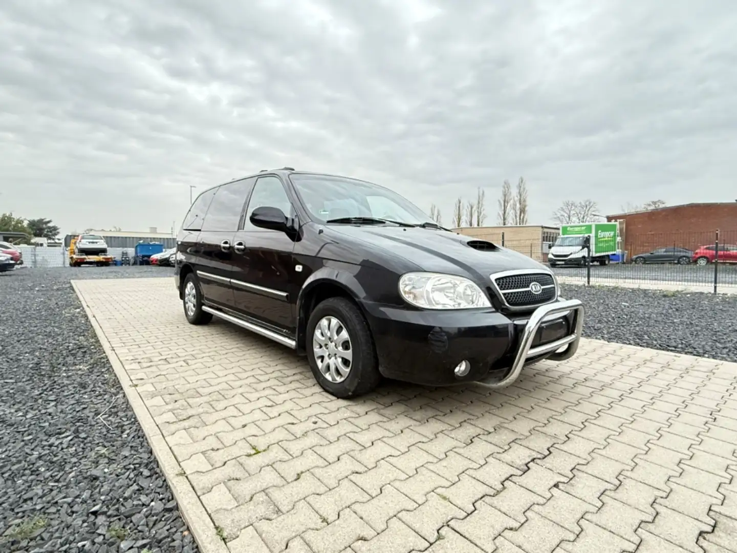 Kia Carnival II 2.9 CRDi EX Leder 7 Sitze Klima PDC Schwarz - 1