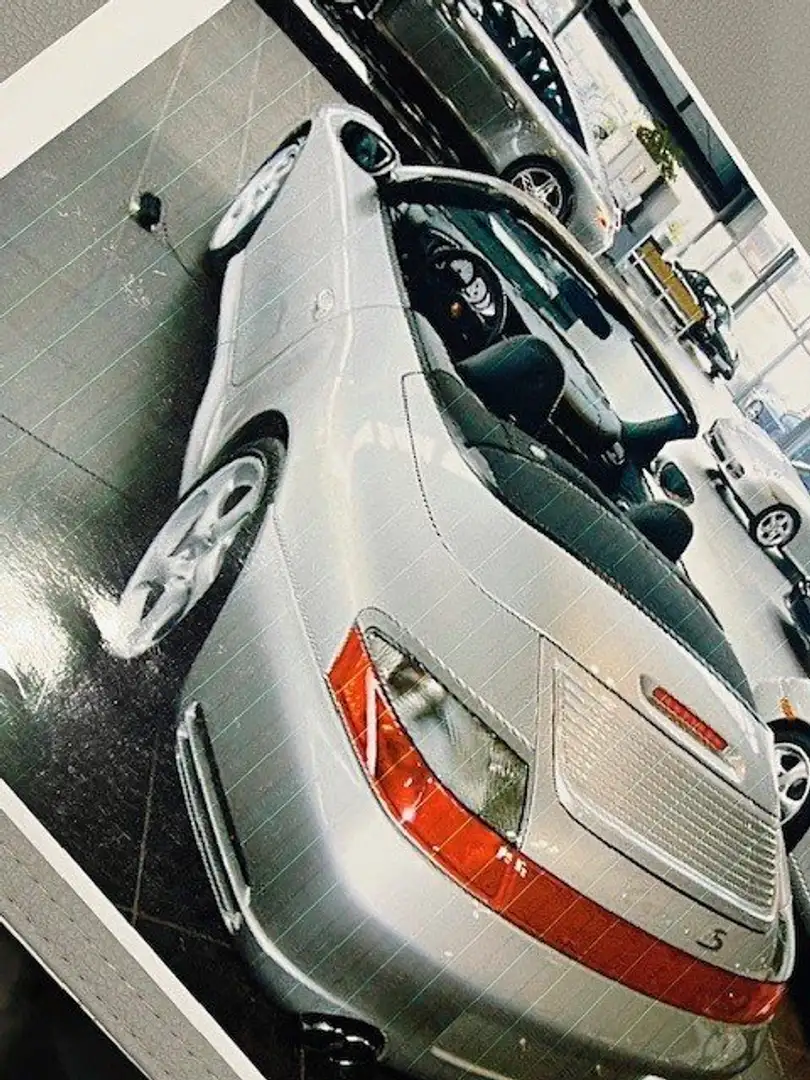 Porsche 996 911 Carrera 4S Cabrio Срібний - 1