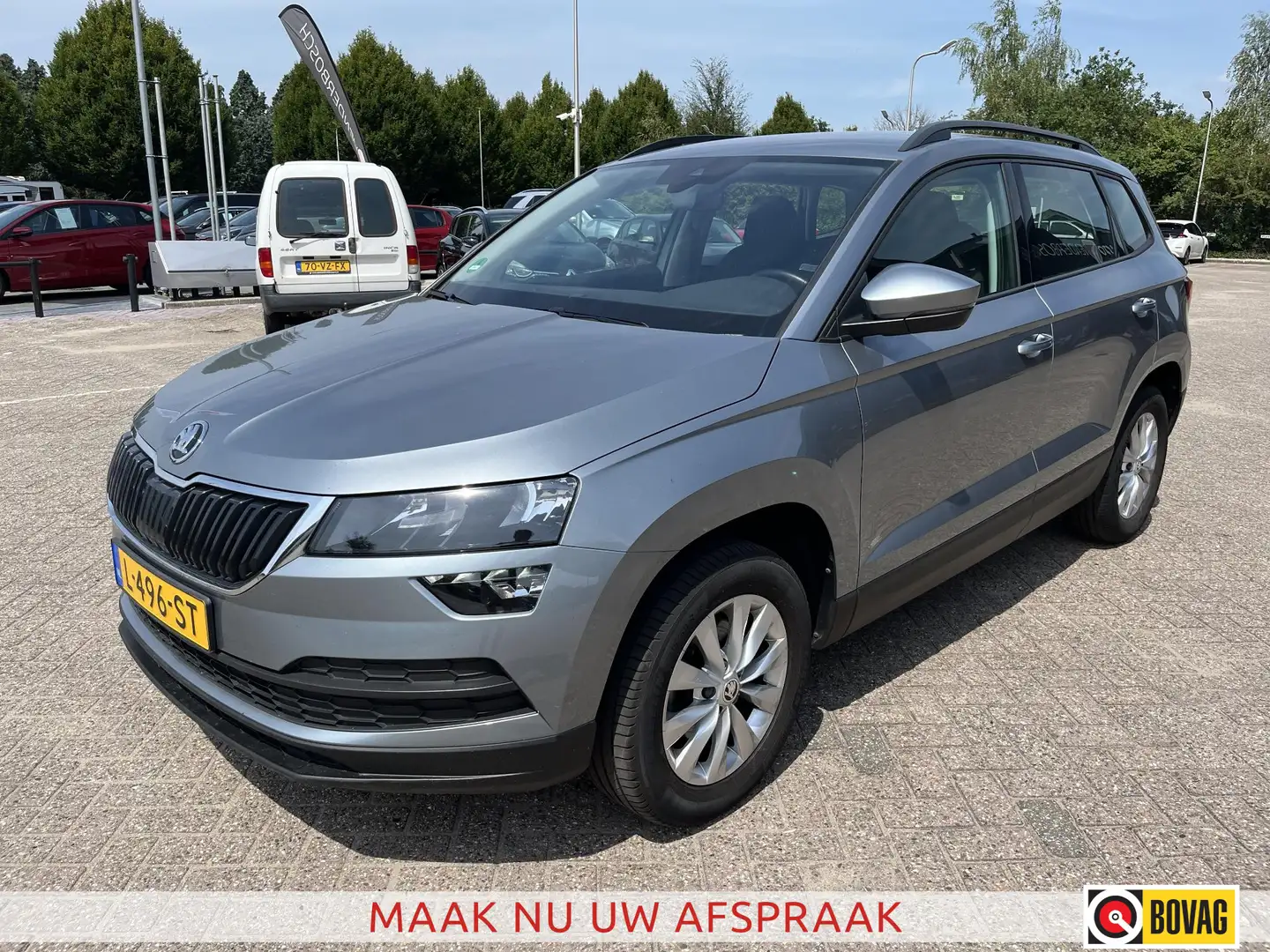 Skoda Karoq 1.0 TSI Business Edition 110pk | Adaptive | Carpla Grijs - 1