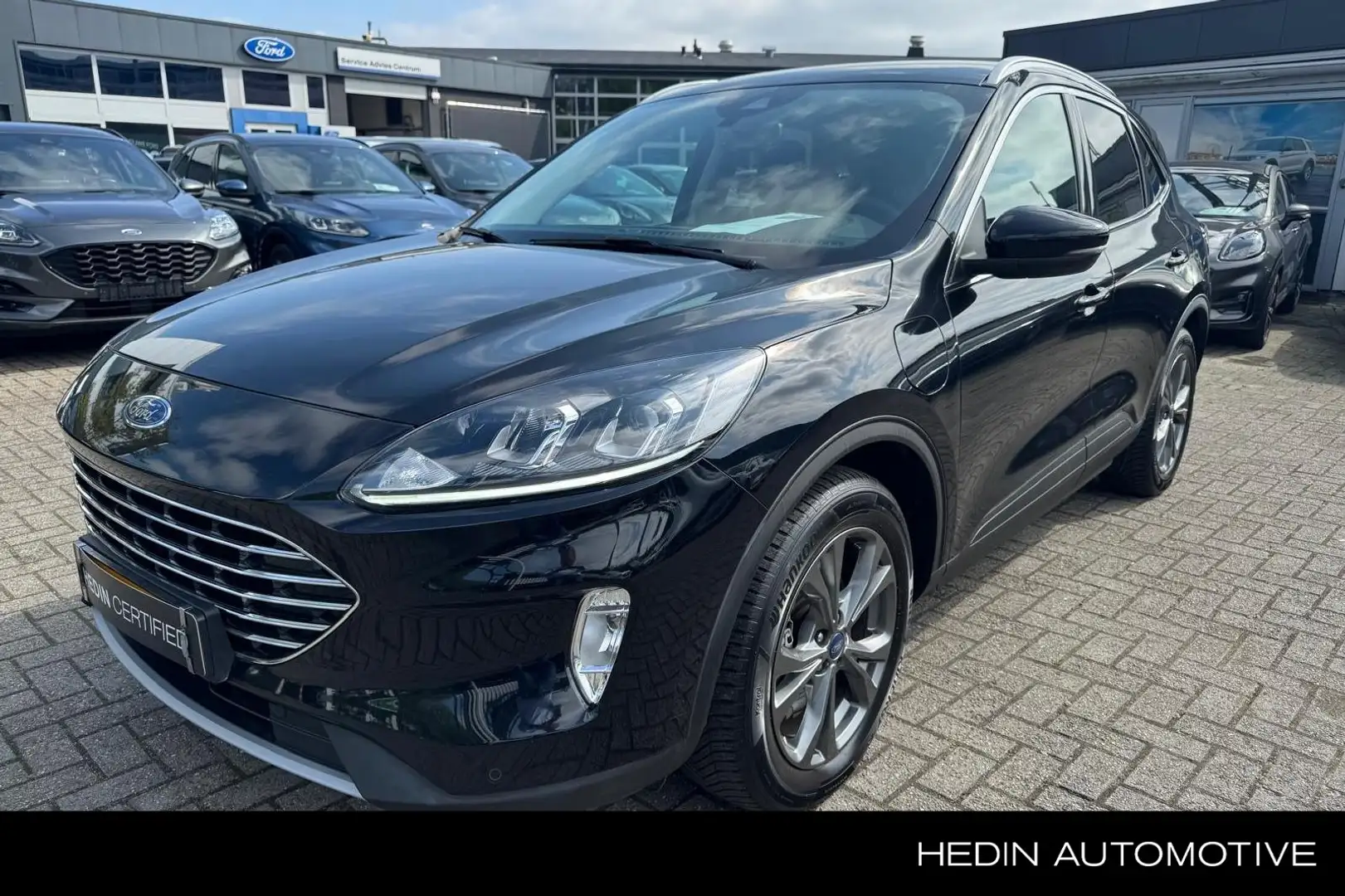 Ford Kuga 2.5 PHEV 225 pk Titanium | Winter Pack | Navi | Al Schwarz - 1