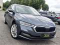 Skoda Octavia Combi 1.4 TSI iV HYBRIDE DSG ADAPTIVE LED LIGHTS Grijs - thumbnail 1