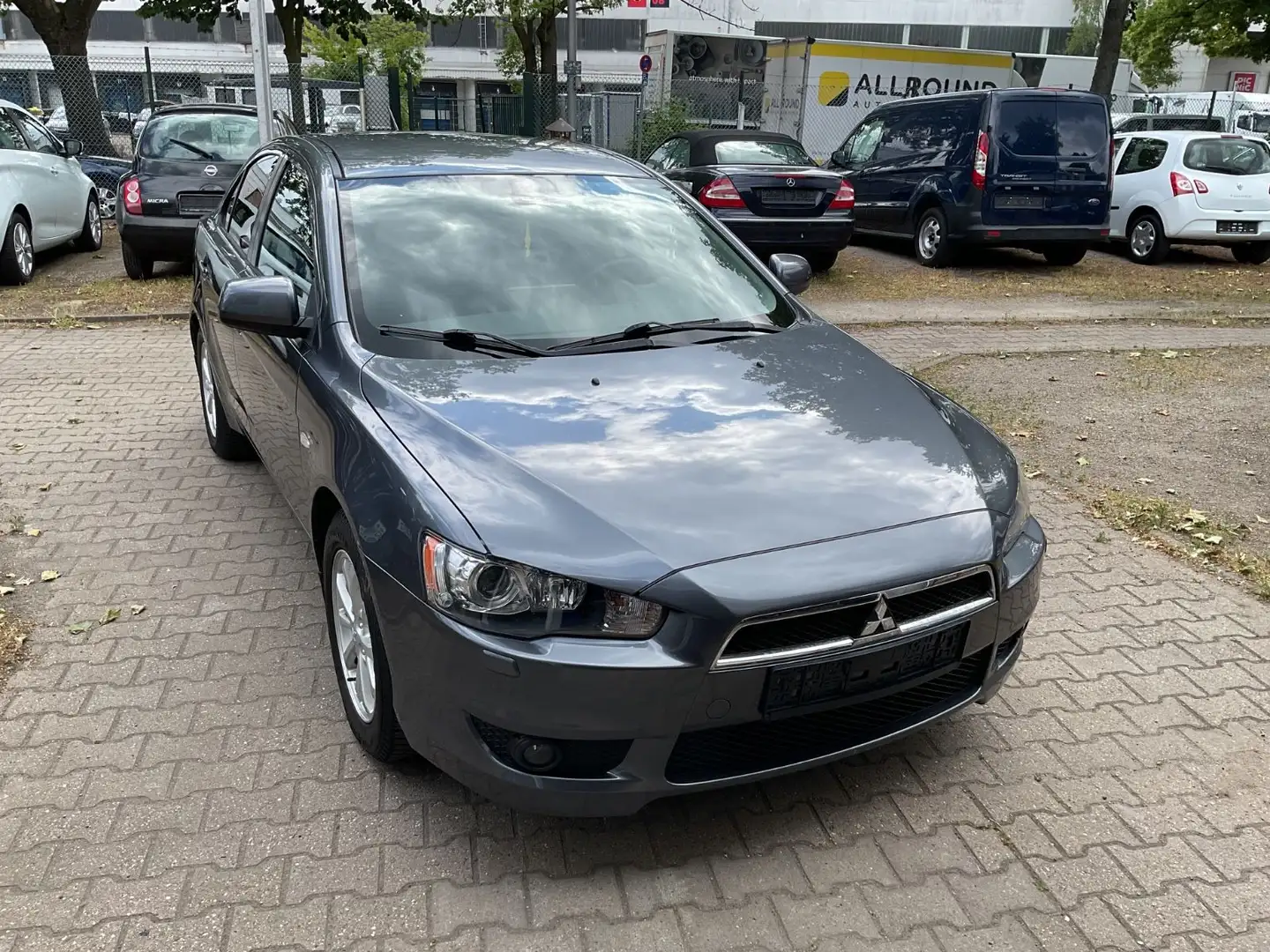 Mitsubishi Lancer Lim. XTRA Grau - 1
