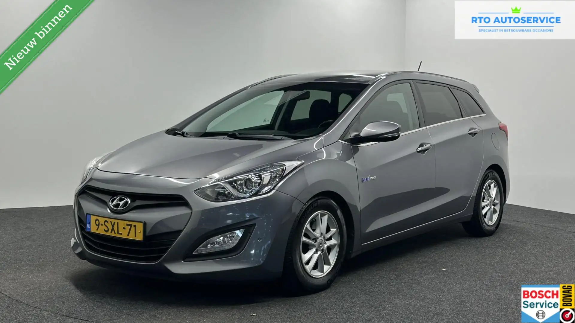 Hyundai i30 Wagon 1.6 GDI Business Edition NAVIGATIE. Gris - 1