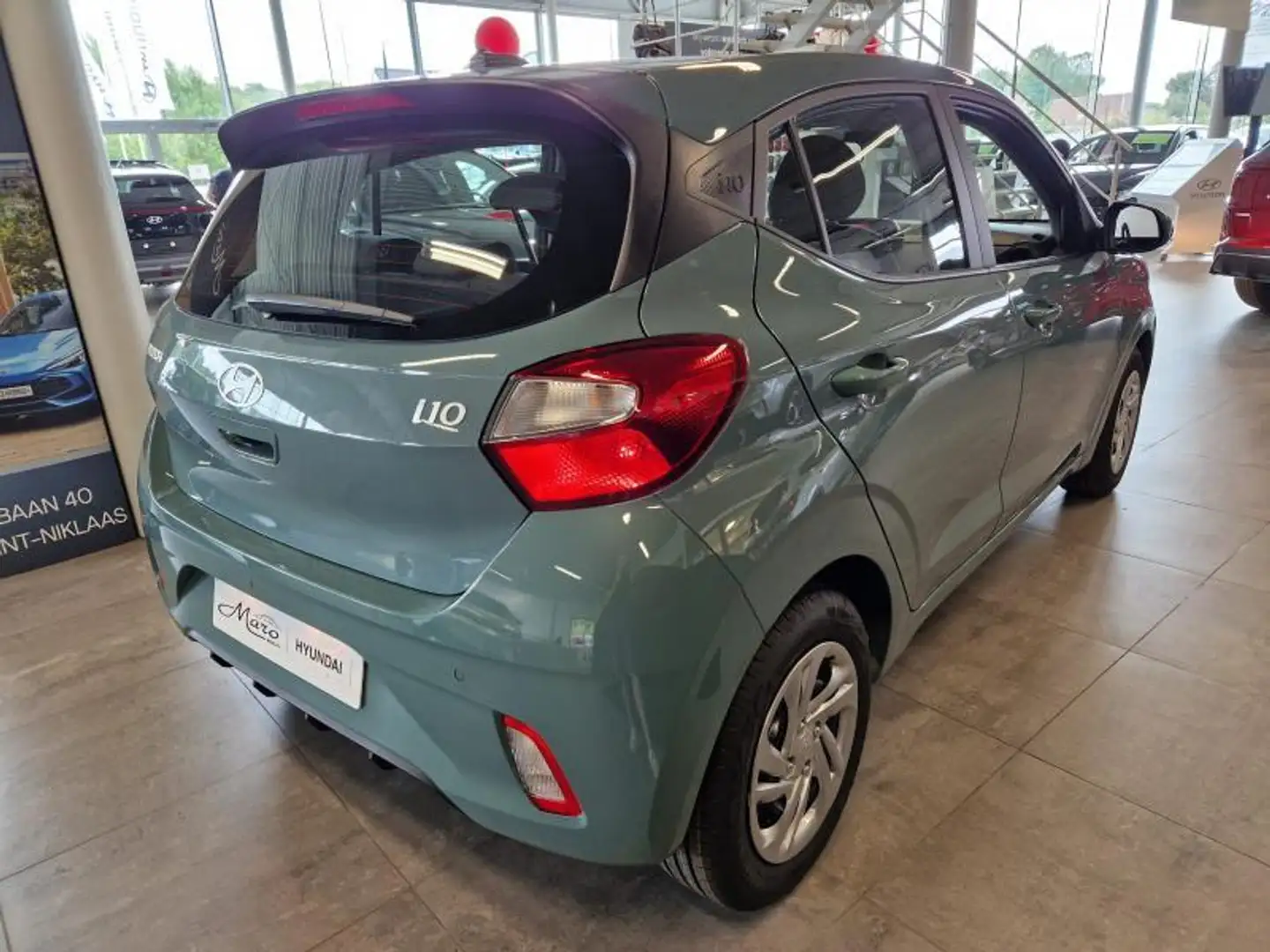 Hyundai i10 1.0i Twist | GPS, camera, cruise,... | STOCK! Groen - 2
