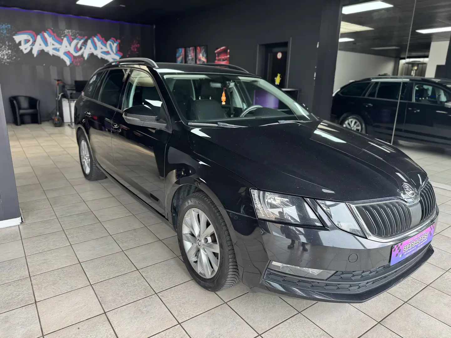 Skoda Octavia SW 1.6 CR TDi Active Zwart - 1