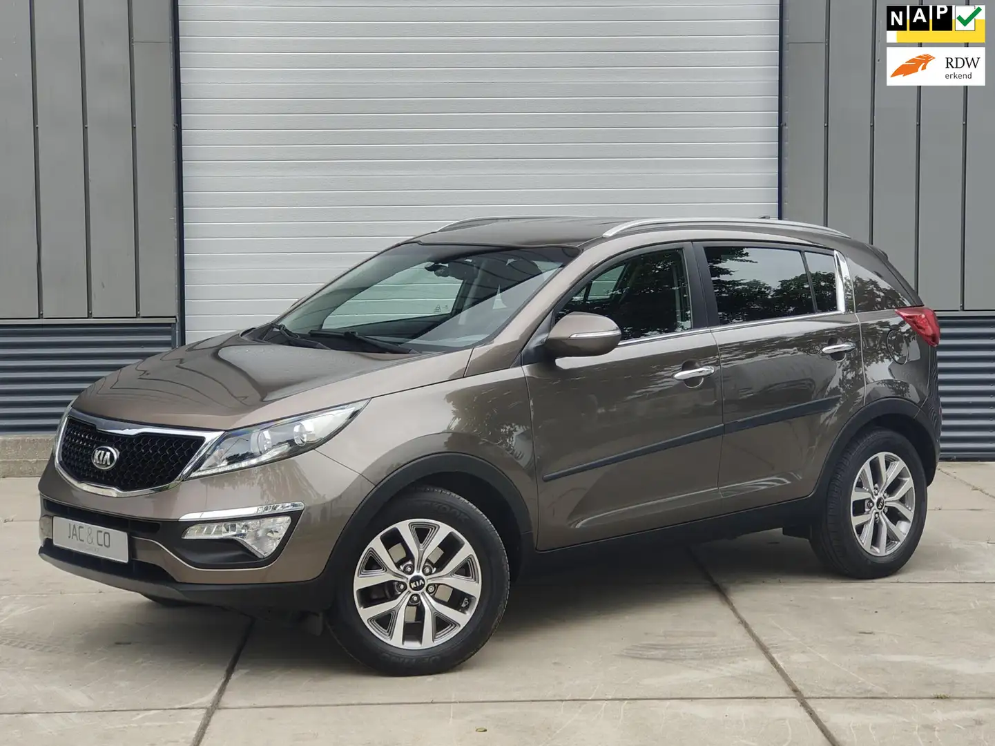 Kia Sportage 1.6 GDI X-treme DynamicLine Navigatie - Leer - Cam Braun - 1