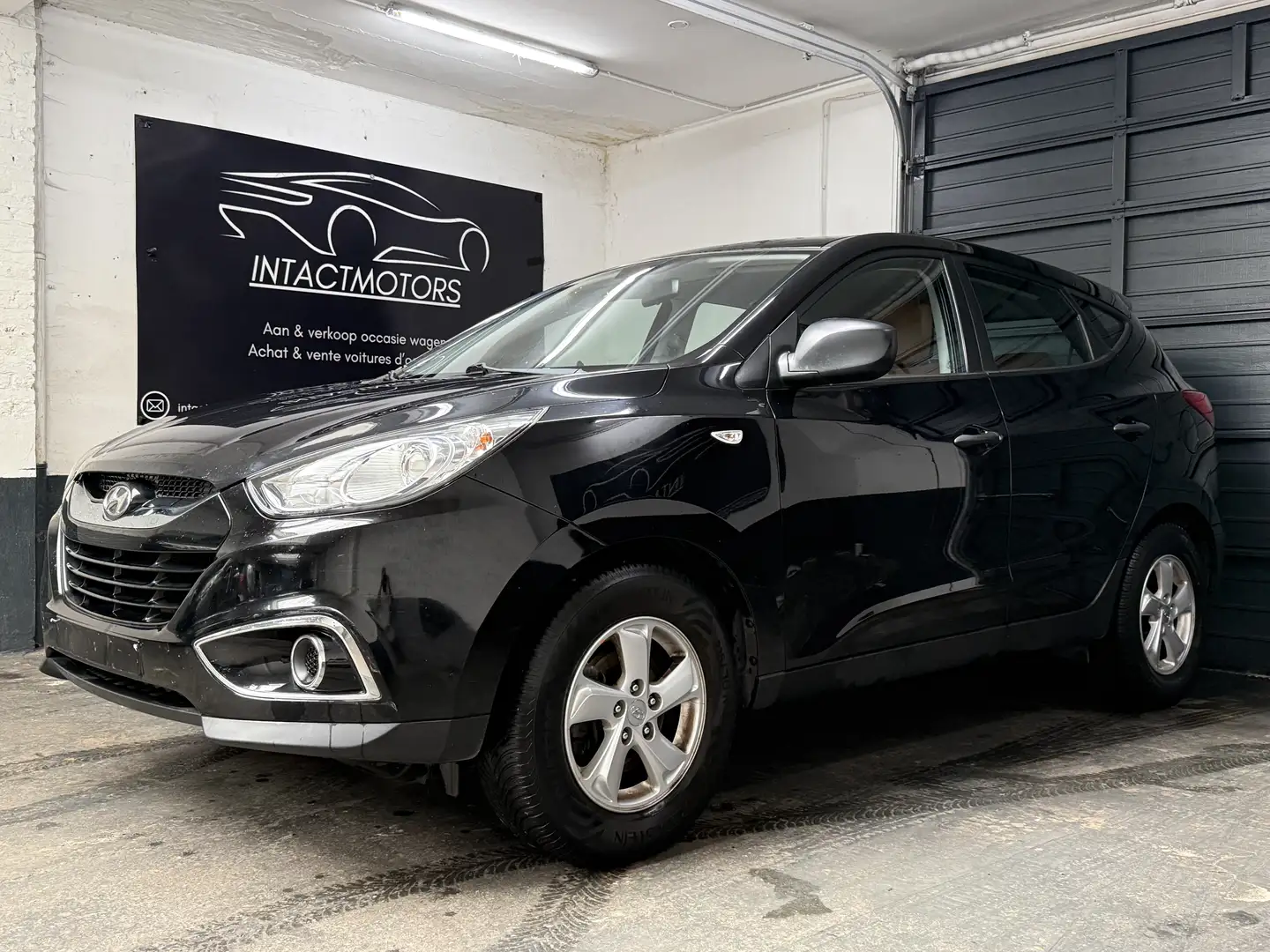 Hyundai iX35 ix35 1.6 2WD blue Comfort 97.000 KM Zwart - 2