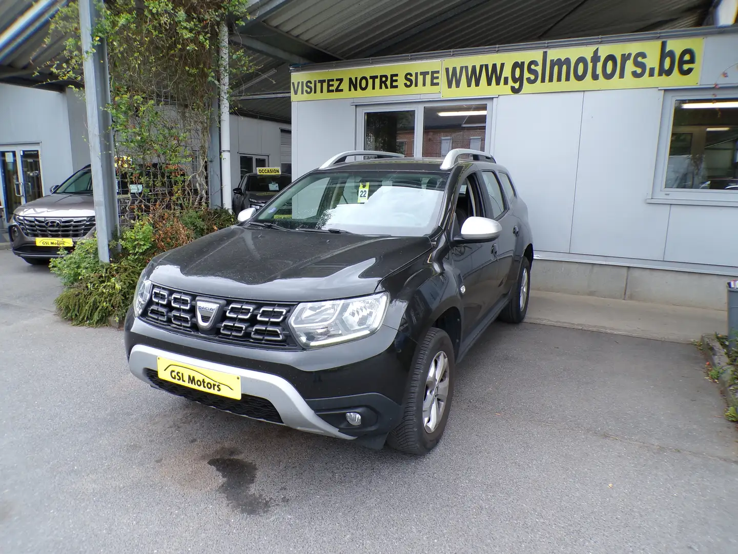 Dacia Duster 1.0 TCe 100cv noir 10/20 97.045km Airco GPS Cruise Zwart - 1