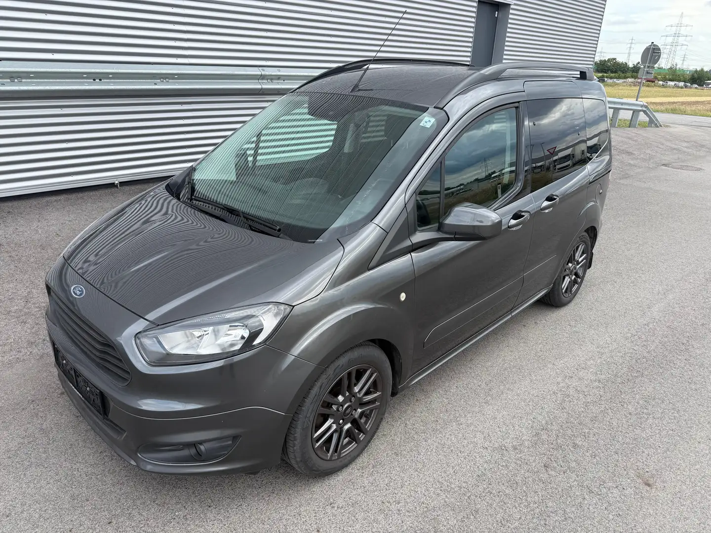 Ford Tourneo Courier 1,0 EcoBoost Sport ID:104 Grau - 1