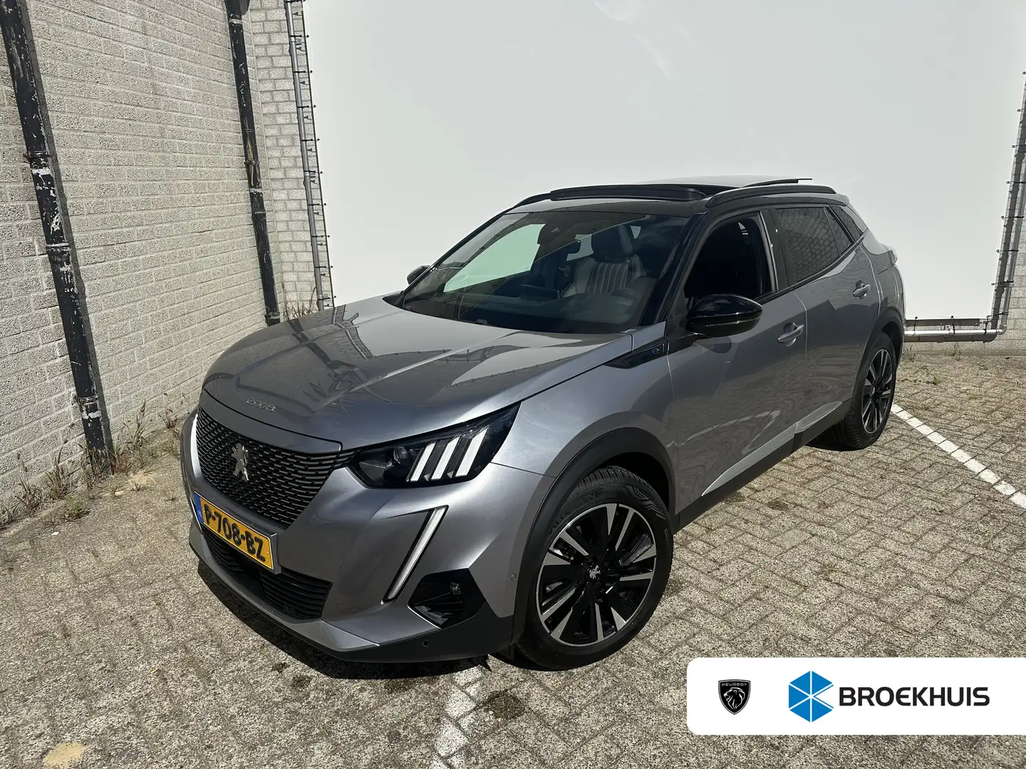 Peugeot e-2008 EV GT Pack 50 kWh 3-Fase | Achterbank in delen nee Gris - 1