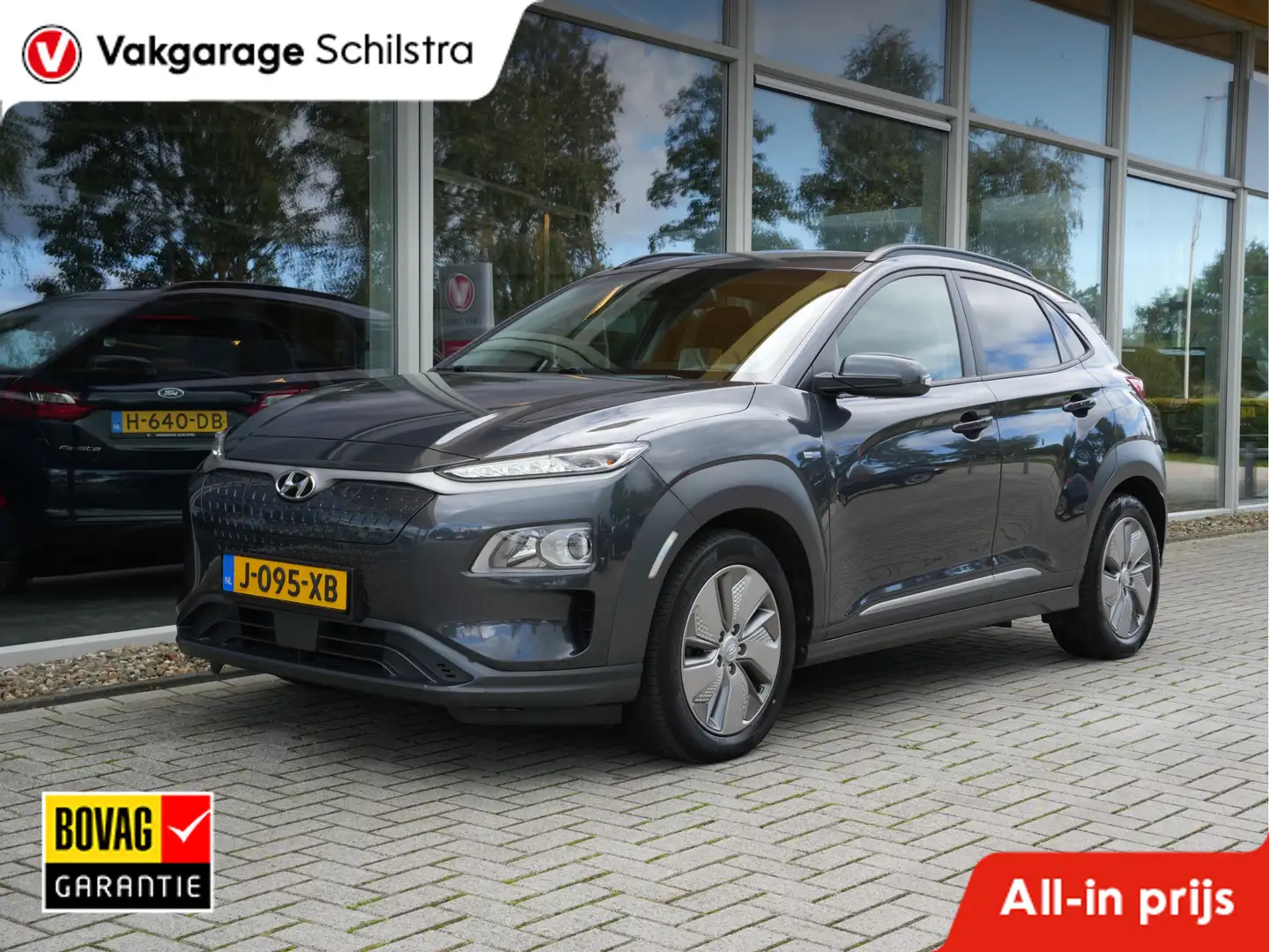 Hyundai KONA EV Fashion 64 kWh 3 Fase | SoH 100% | Navigatie | Gris - 1