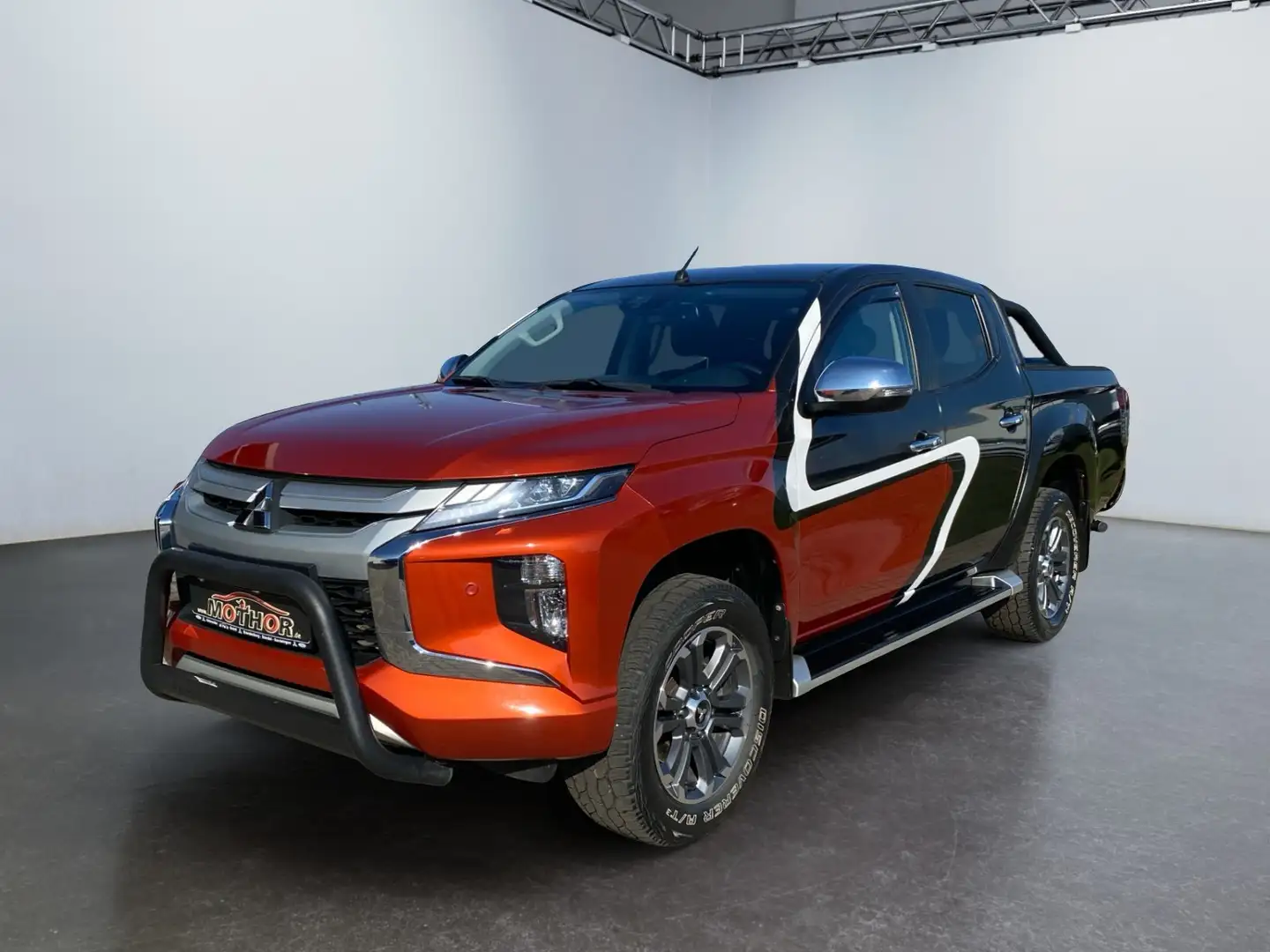 Mitsubishi L200 SPIRIT 2,2 DI-D AT DC TEMP PDC SHZ DAB Arancione - 2