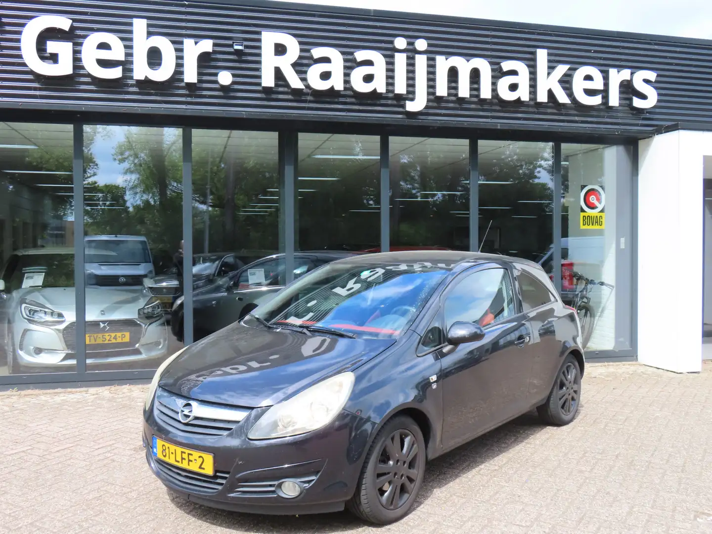 Opel Corsa 1.0-12V '111' Edition*Airco*EXPORTPRIJS* Zwart - 1