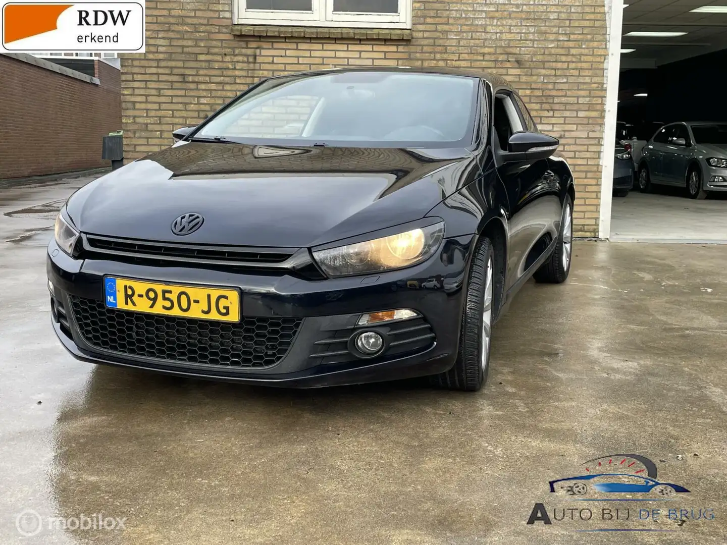 Volkswagen Scirocco 1.4 TSI Highline Navi clima stoelver Zwart - 1