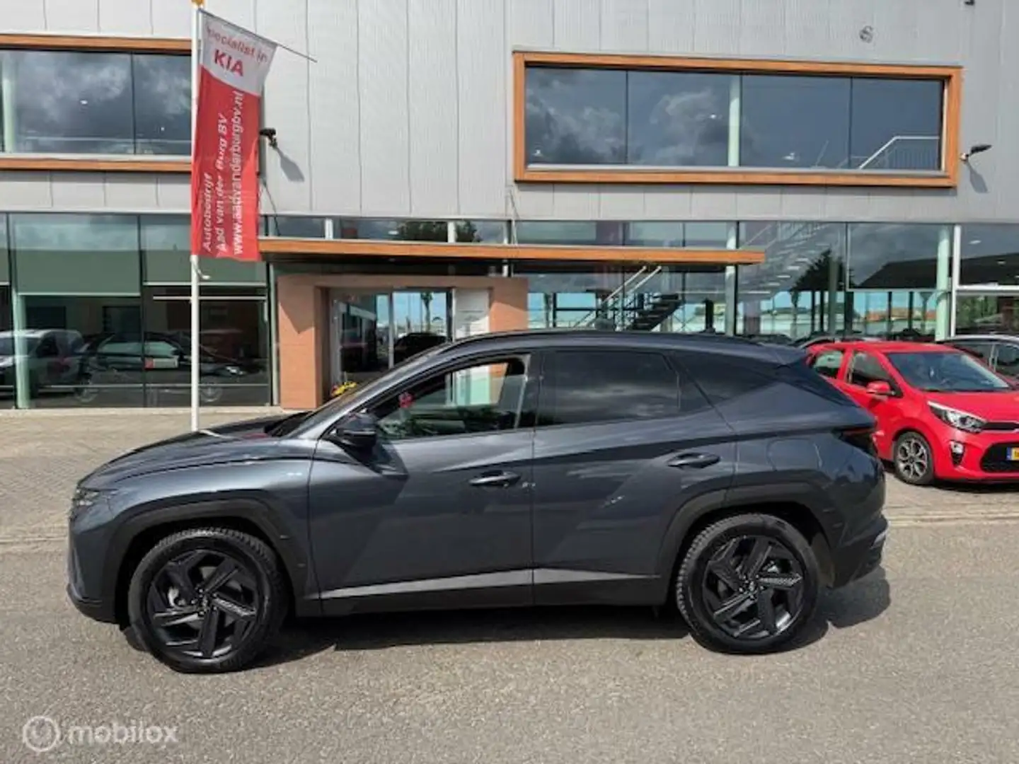 Hyundai TUCSON 1.6 T MHEV BlackLine 4WD Automaat , Trekhaak 1.650 Grigio - 2