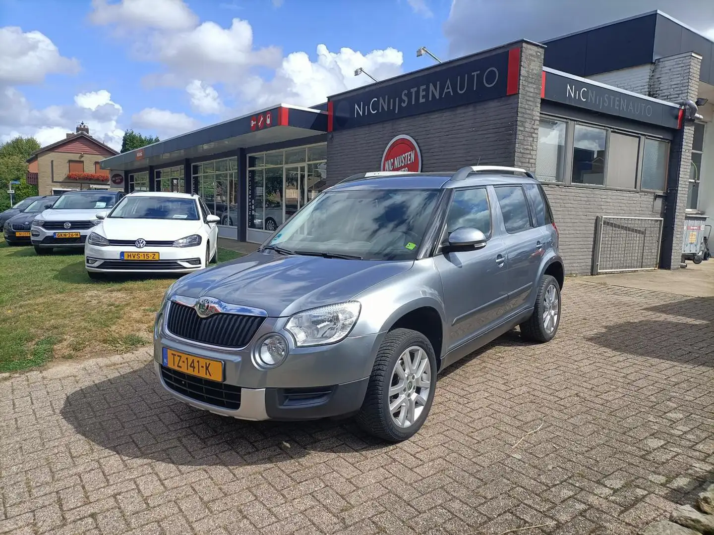 Skoda Yeti 1.4 TSI Ambition Navigatie, Stoelverwarming Gris - 1