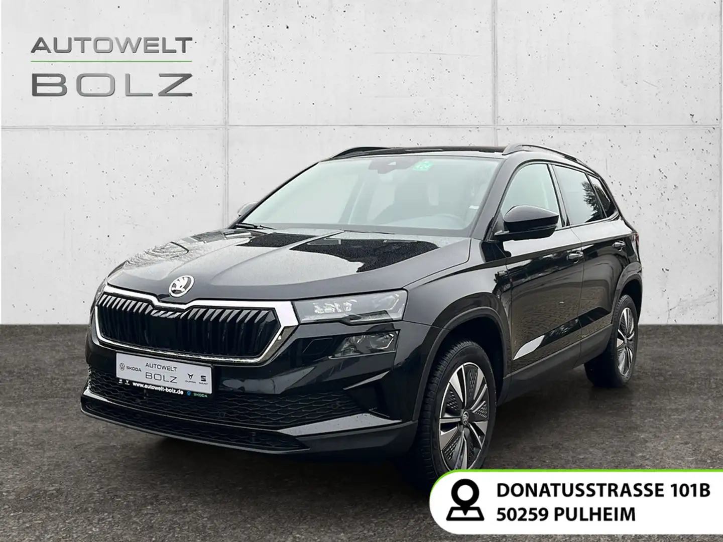 Skoda Karoq Tour 1.5 TSI AHK Navi DigiCock LED Kamera Schwarz - 1