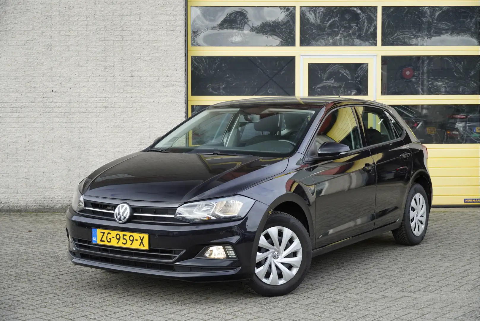 Volkswagen Polo 1.0 TSI 5drs Comfortline BJ2019 Led | Pdc | Navi | Zwart - 1