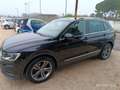 Volkswagen Tiguan Tiguan 2.0 TDI SCR DSG Advanced BlueMotion Technol Zwart - thumbnail 1