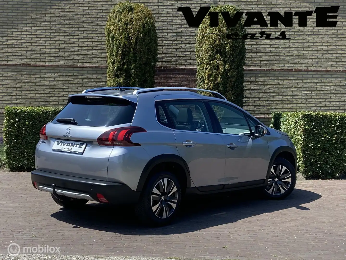 Peugeot 2008 1.2 PureTech Allure Aut.*Airco*Cruise*Dealer OH Gris - 2