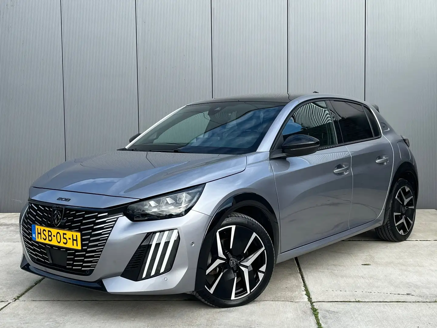 Peugeot 208 Hybrid 136 e-DCS6 GT AUT / Panoramadak Gris - 1