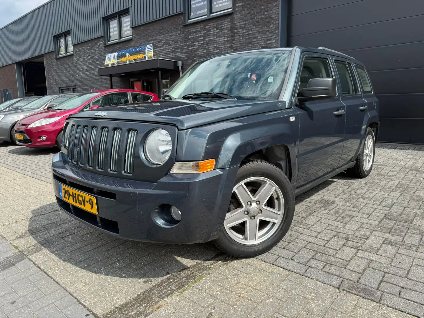 Jeep Patriot 2.4 Sport Adventure | NIEUWE APK | AIRCO | CRUISE Blauw - 1